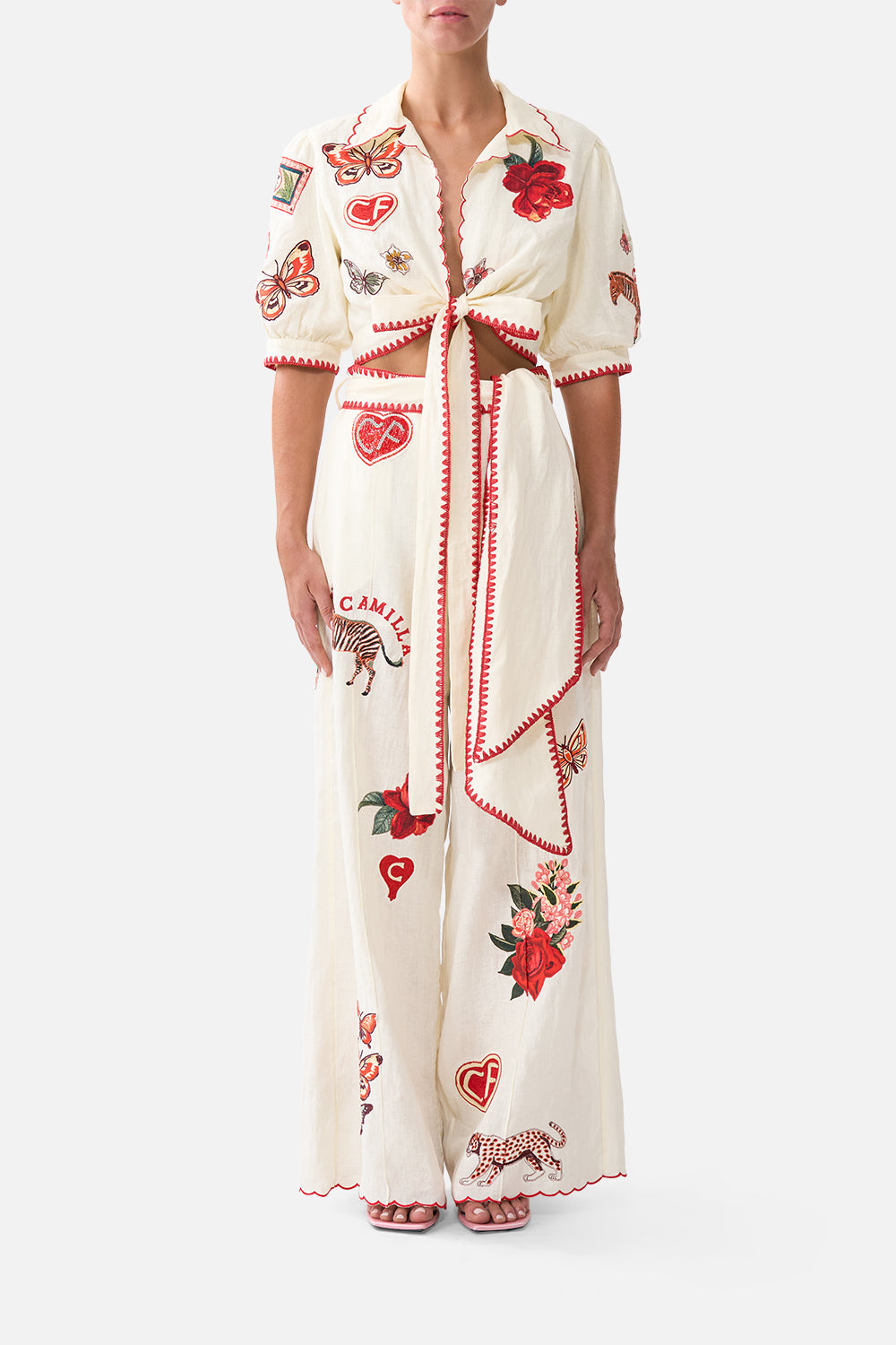 The CAMILLA CROPPED TOP WITH TIE FRONT HIGH CLASS HOOKAH in our HIGH CLASS HOOKAH print.