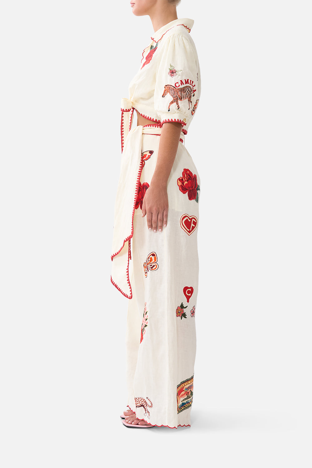 The CAMILLA CROPPED TOP WITH TIE FRONT HIGH CLASS HOOKAH in our  print.