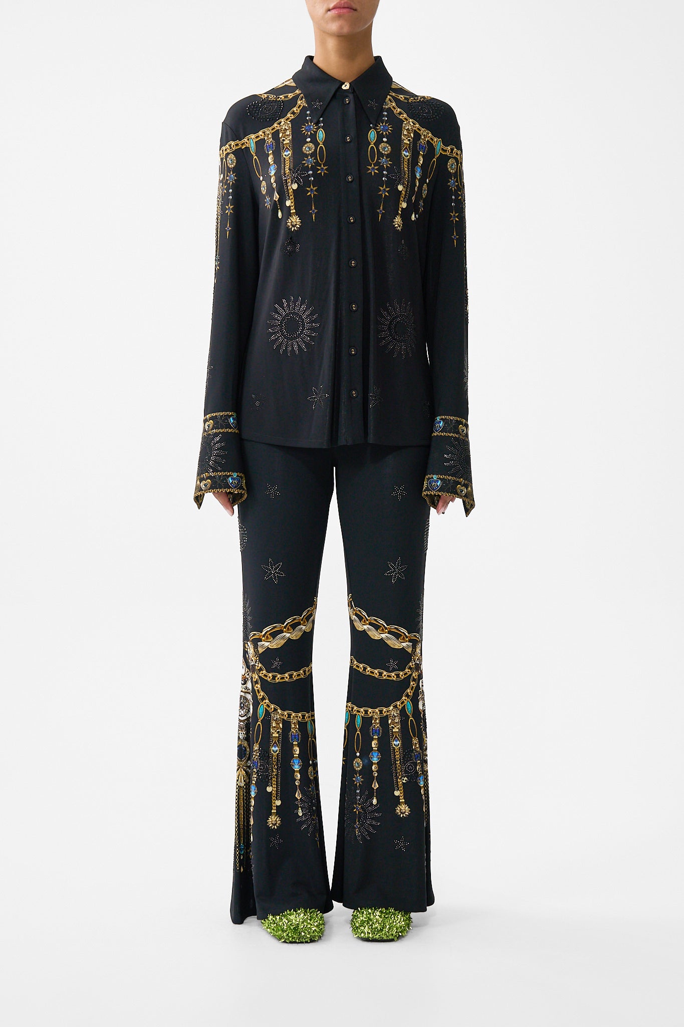 The CAMILLA JERSEY FLARED PANT AMULETS AND ALCHEMY in our AMULETS AND ALCHEMY print.