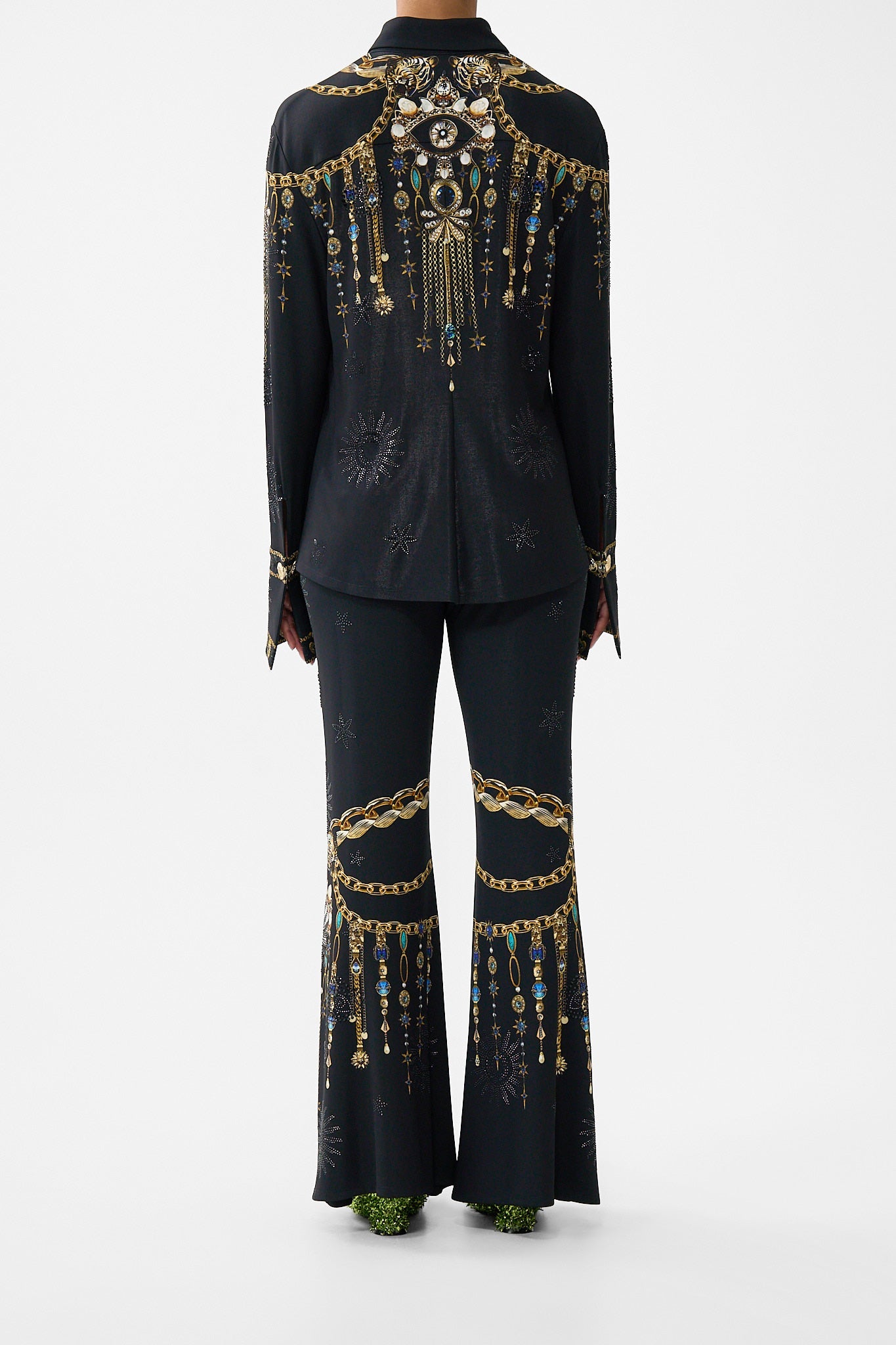 The CAMILLA JERSEY FLARED PANT AMULETS AND ALCHEMY in our  print.