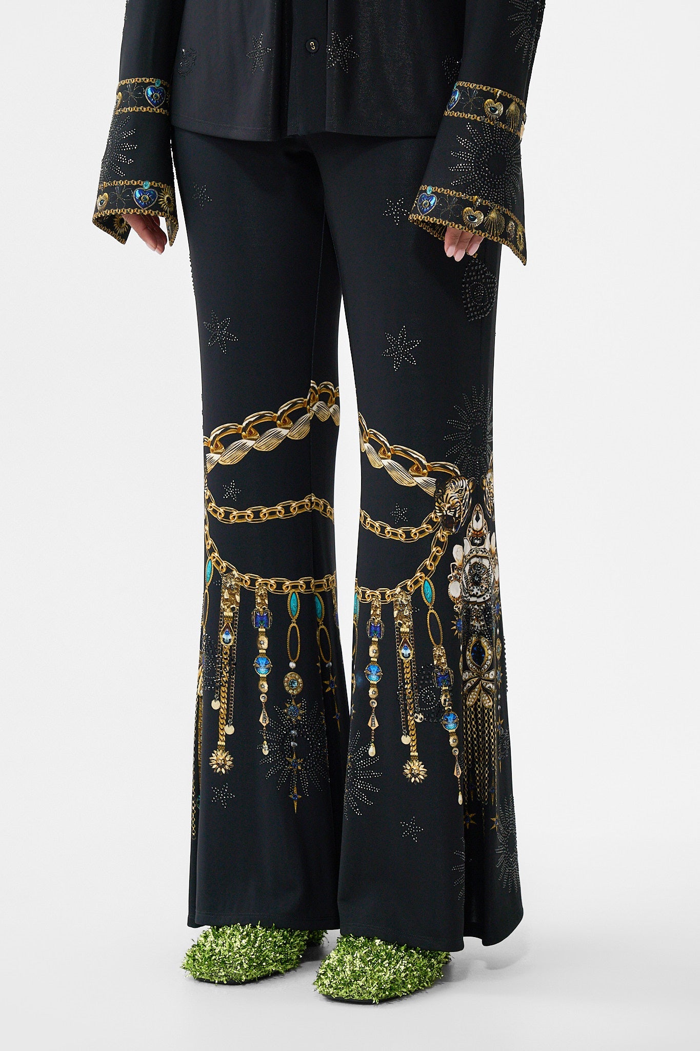 The CAMILLA JERSEY FLARED PANT AMULETS AND ALCHEMY in our  print.