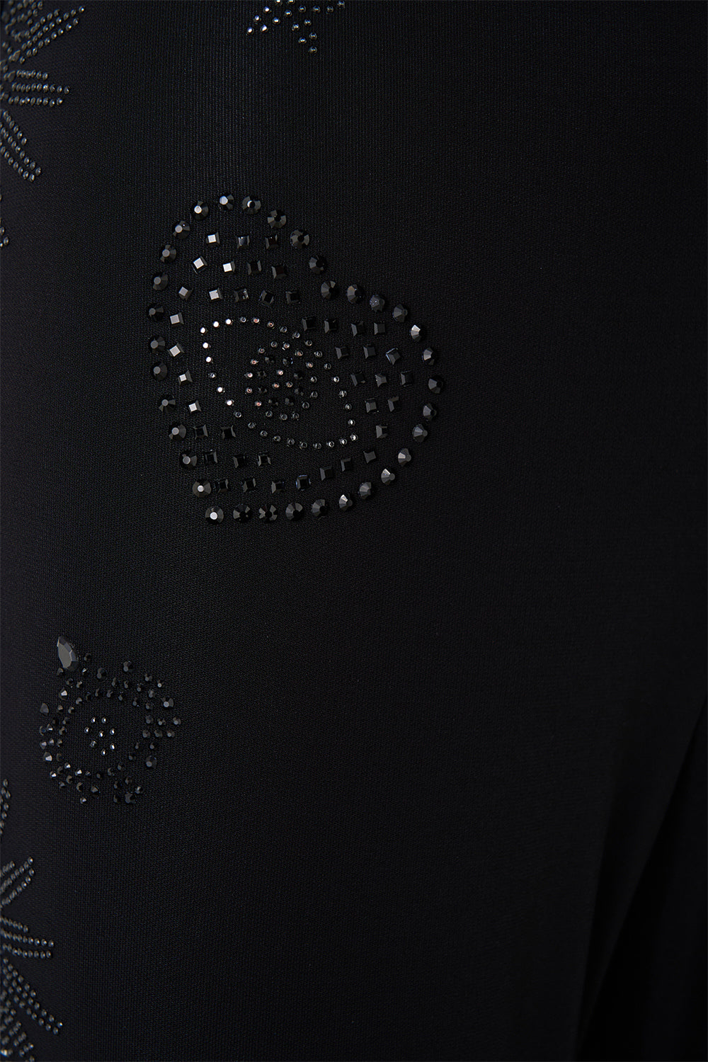 The CAMILLA JERSEY FLARED PANT AMULETS AND ALCHEMY in our  print.