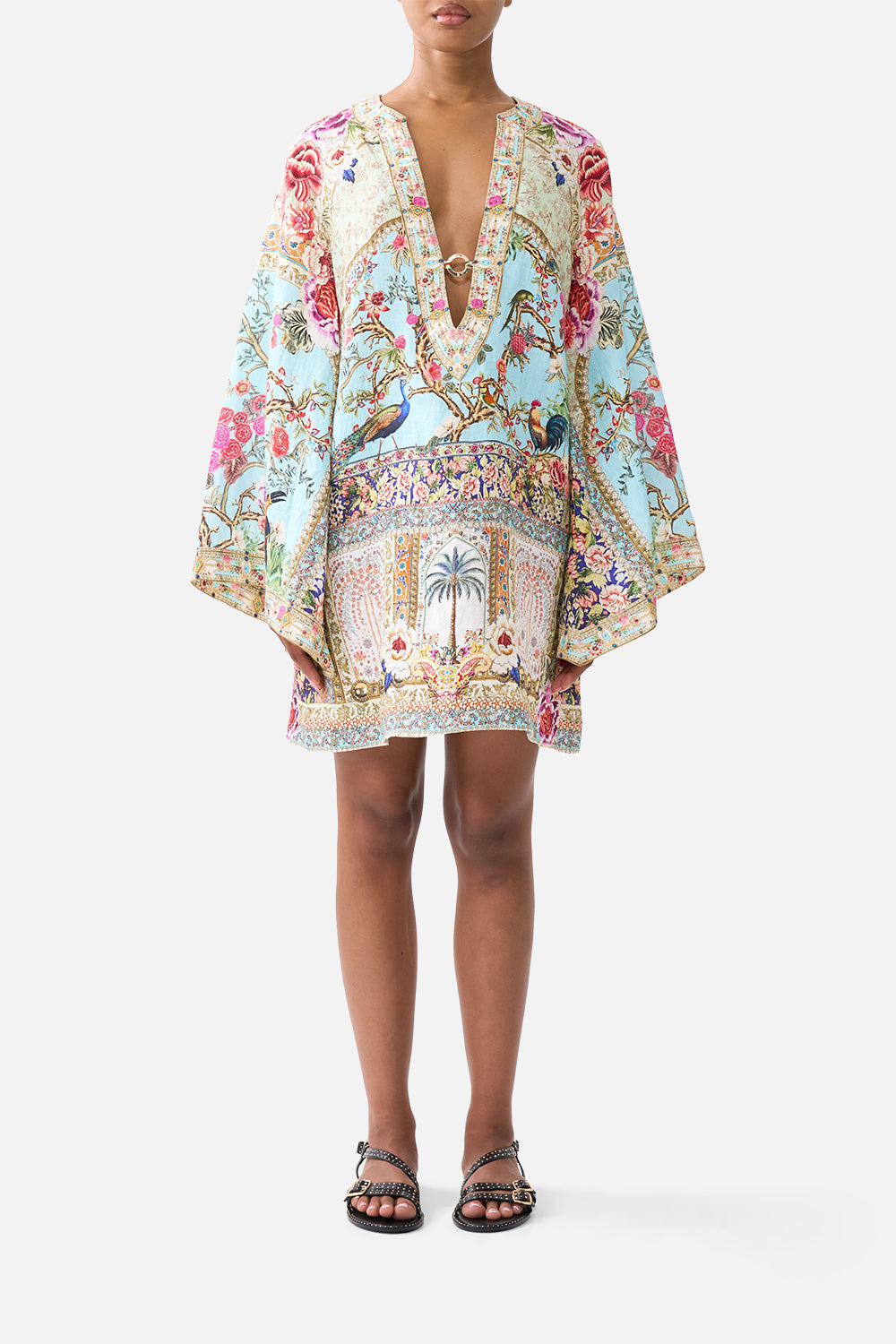 The CAMILLA DEEP V-NECK HARDWARE SHORT KAFTAN SULTANS AND QUEENS in our SULTANS AND QUEENS print.