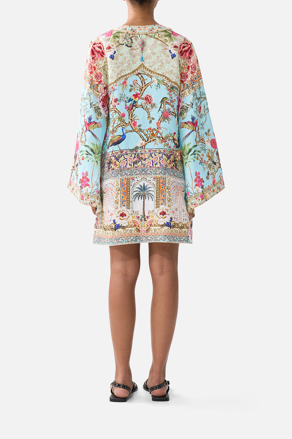 The CAMILLA DEEP V-NECK HARDWARE SHORT KAFTAN SULTANS AND QUEENS in our  print.