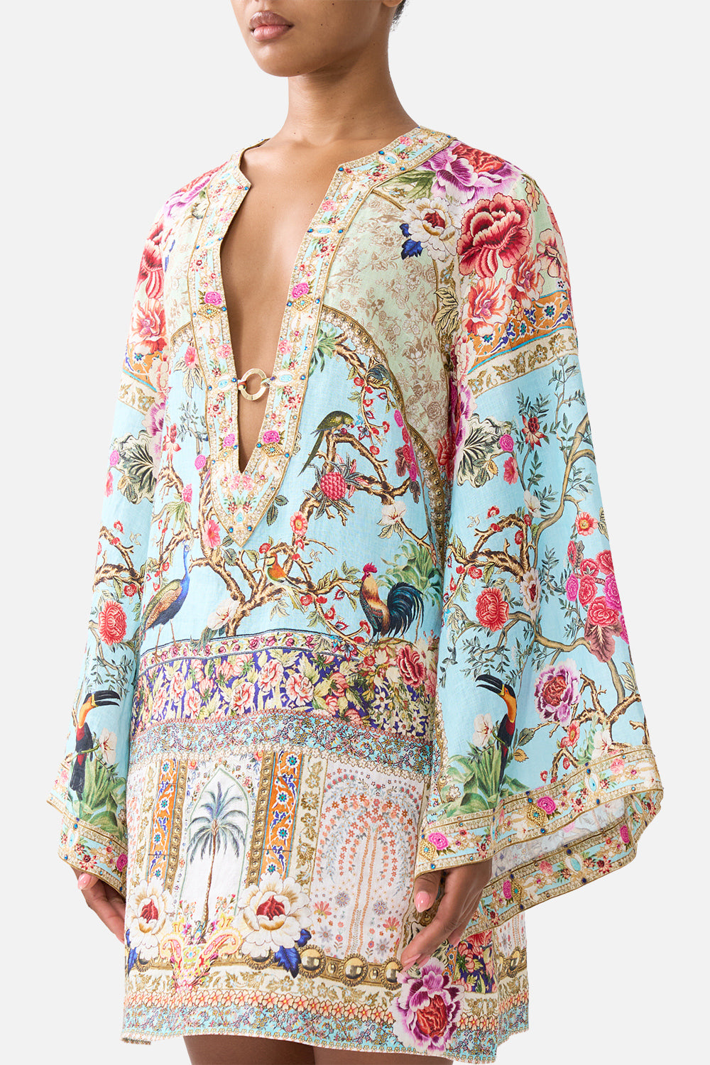 The CAMILLA DEEP V-NECK HARDWARE SHORT KAFTAN SULTANS AND QUEENS in our  print.