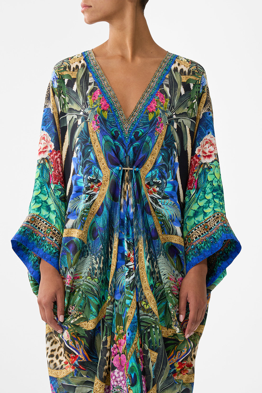 The CAMILLA PIERCED V-NECK KAFTAN ANIMAL ALCHEMY in our  print.