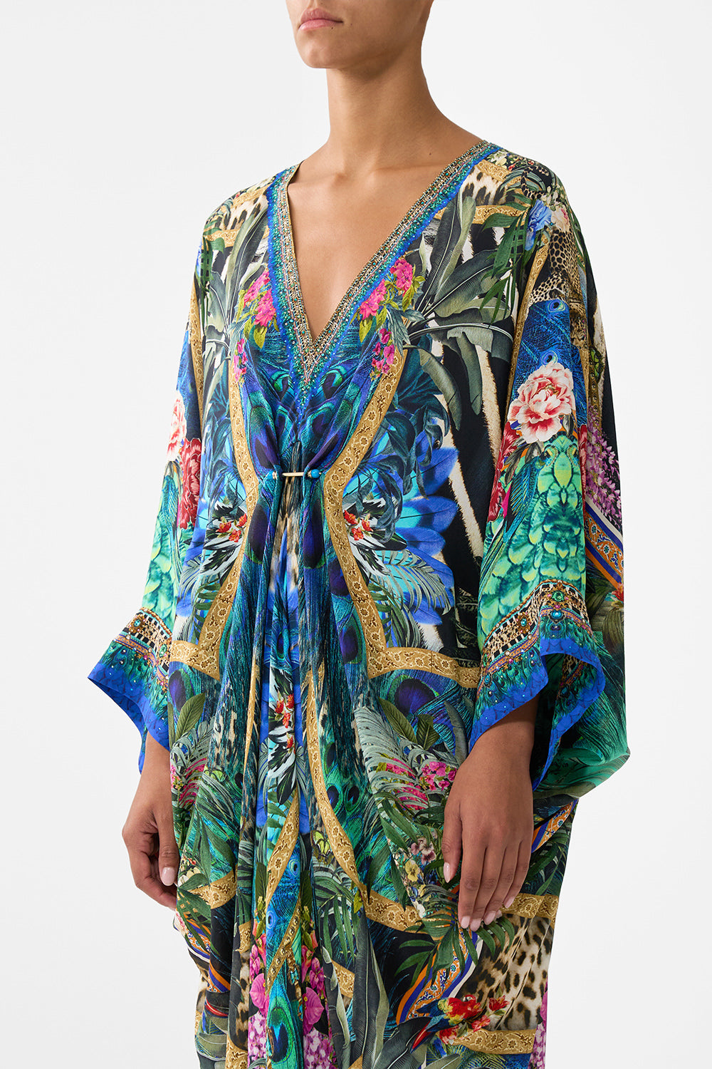 The CAMILLA PIERCED V-NECK KAFTAN ANIMAL ALCHEMY in our  print.