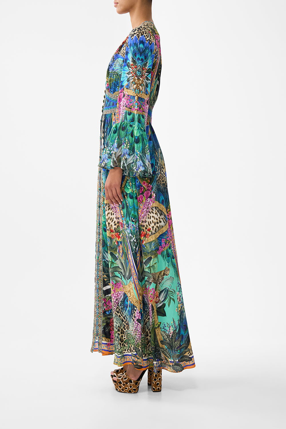 The CAMILLA SHAPED WAISTBAND DRESS WITH RUFFLE SLEEVE ANIMAL ALCHEMY in our  print.