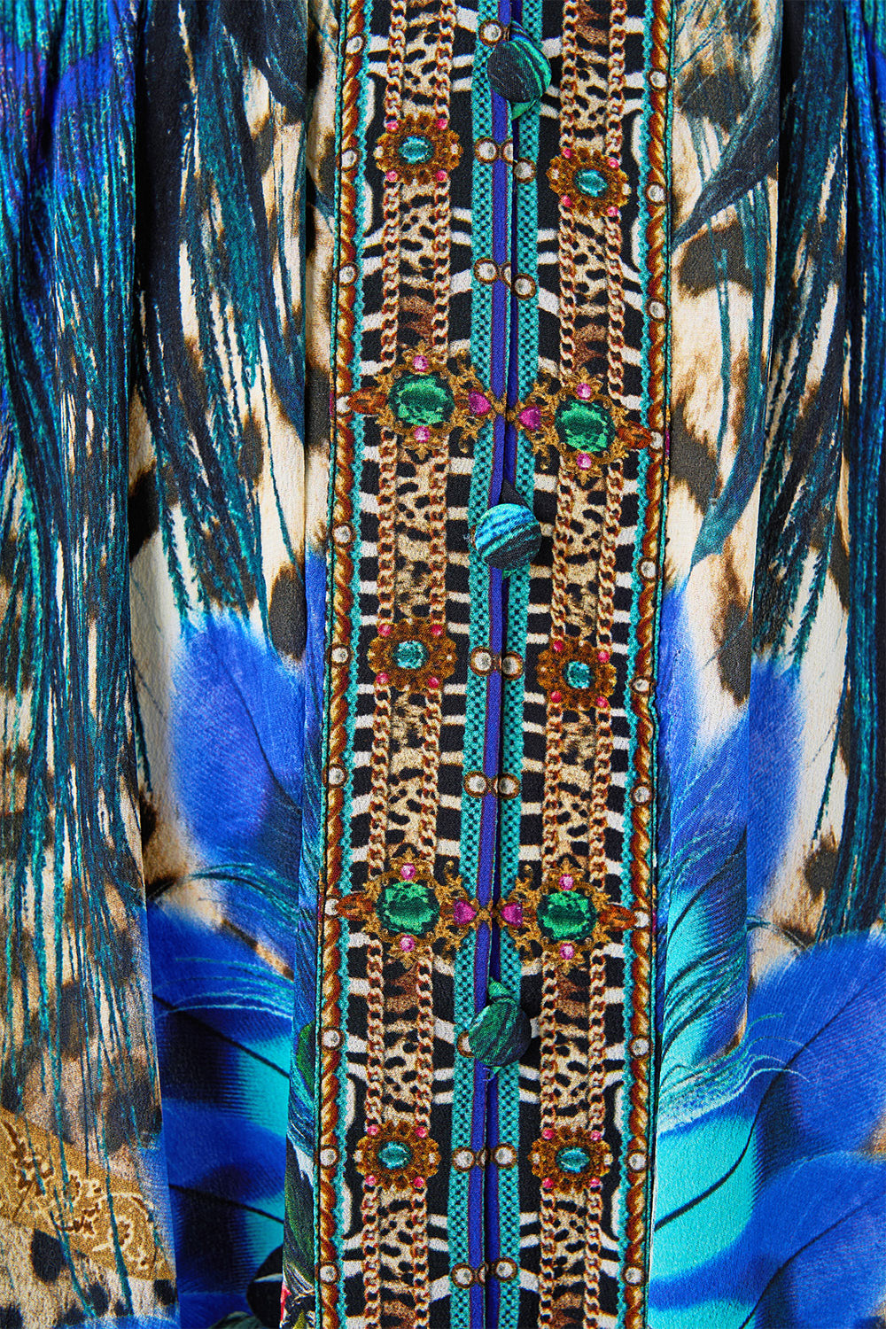 The CAMILLA SHAPED WAISTBAND DRESS WITH RUFFLE SLEEVE ANIMAL ALCHEMY in our  print.