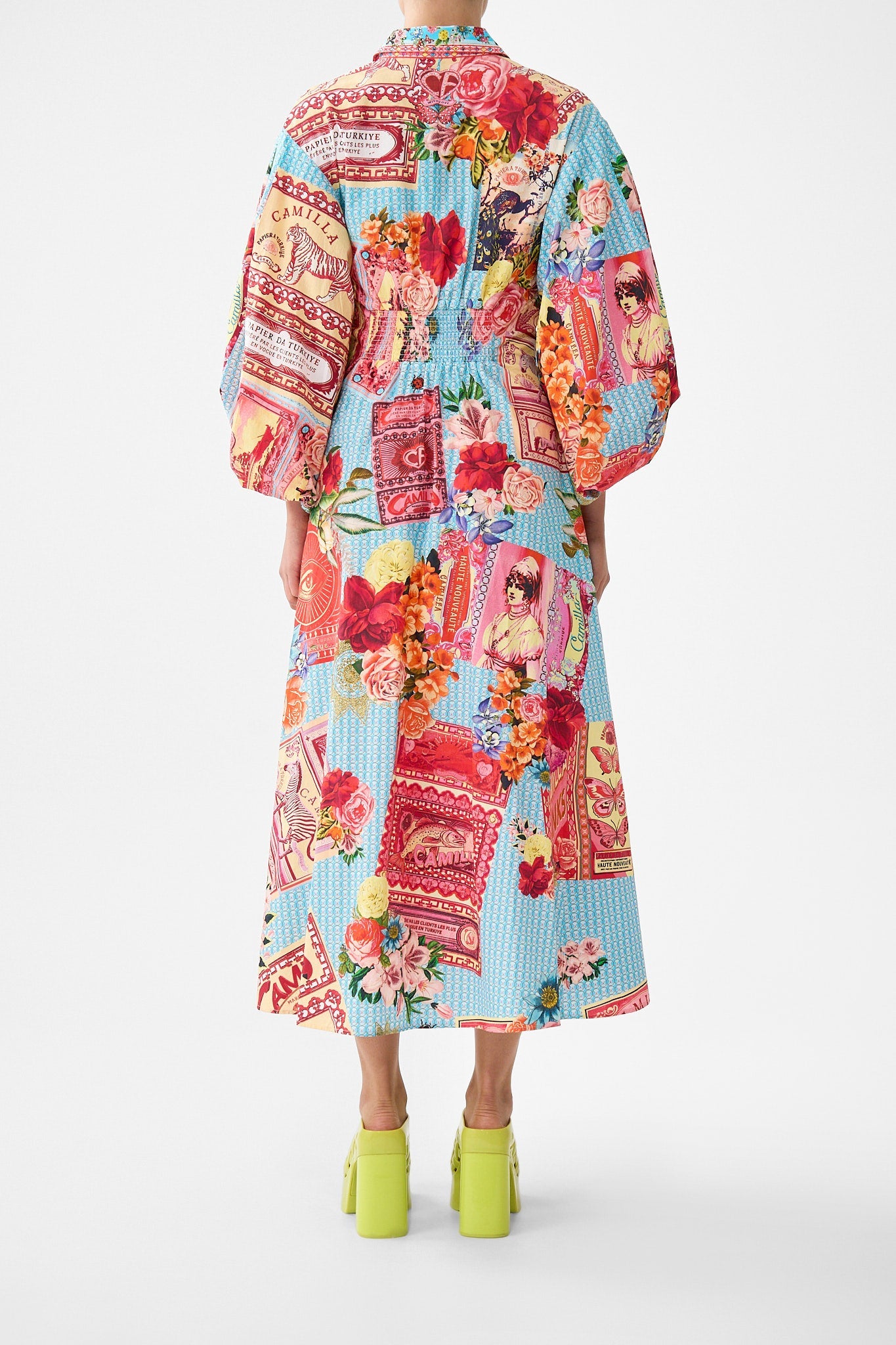 The CAMILLA WAIST TIE SHIRT DRESS WITH BUBBLE SLEEVE PAPERS AND CURIOUS CAPERS in our  print.