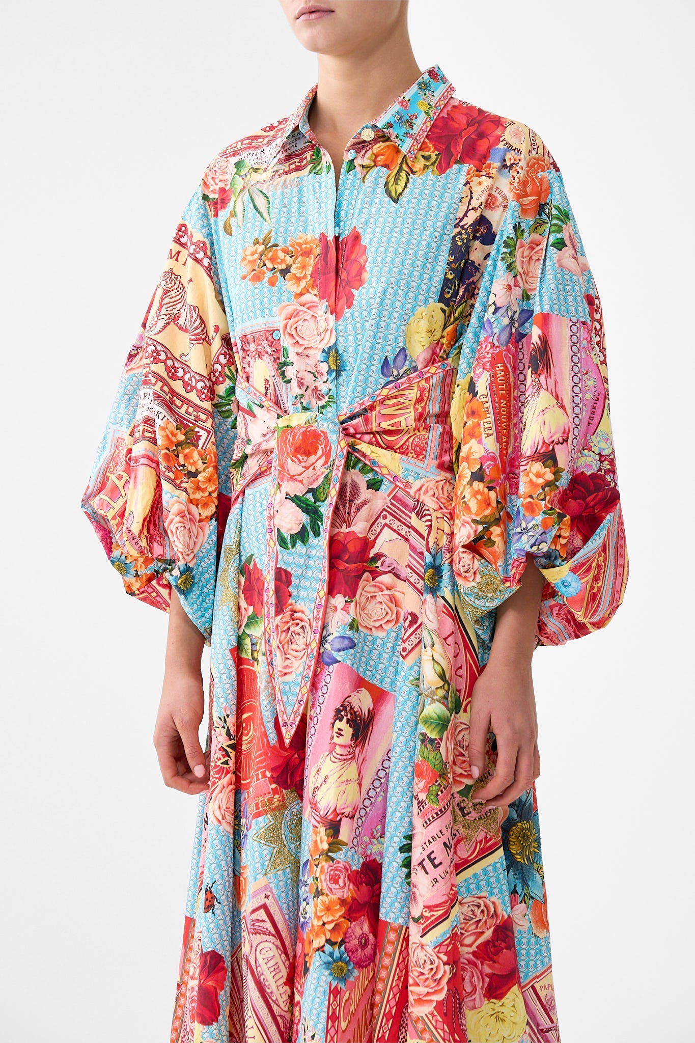 The CAMILLA WAIST TIE SHIRT DRESS WITH BUBBLE SLEEVE PAPERS AND CURIOUS CAPERS in our  print.