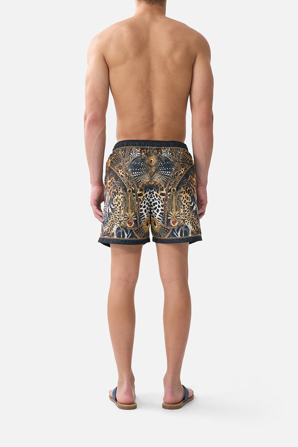 The CAMILLA mid length boardshort with elastic waist from our print feline folklore, back model view