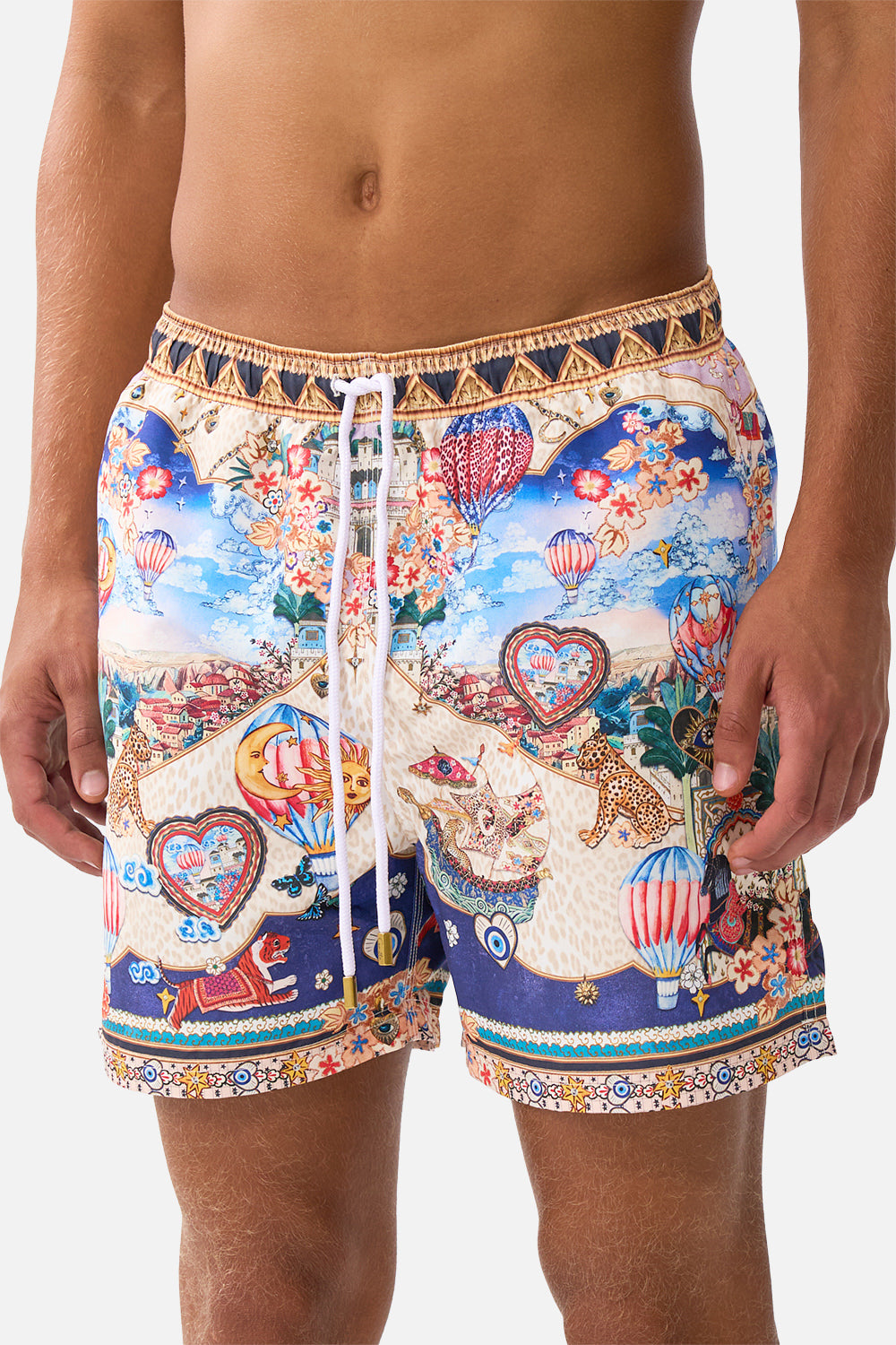 The CAMILLA MID LENGTH BOARDSHORT WITH ELASTIC WAIST KAPADOKYA KITSCH in our  print.