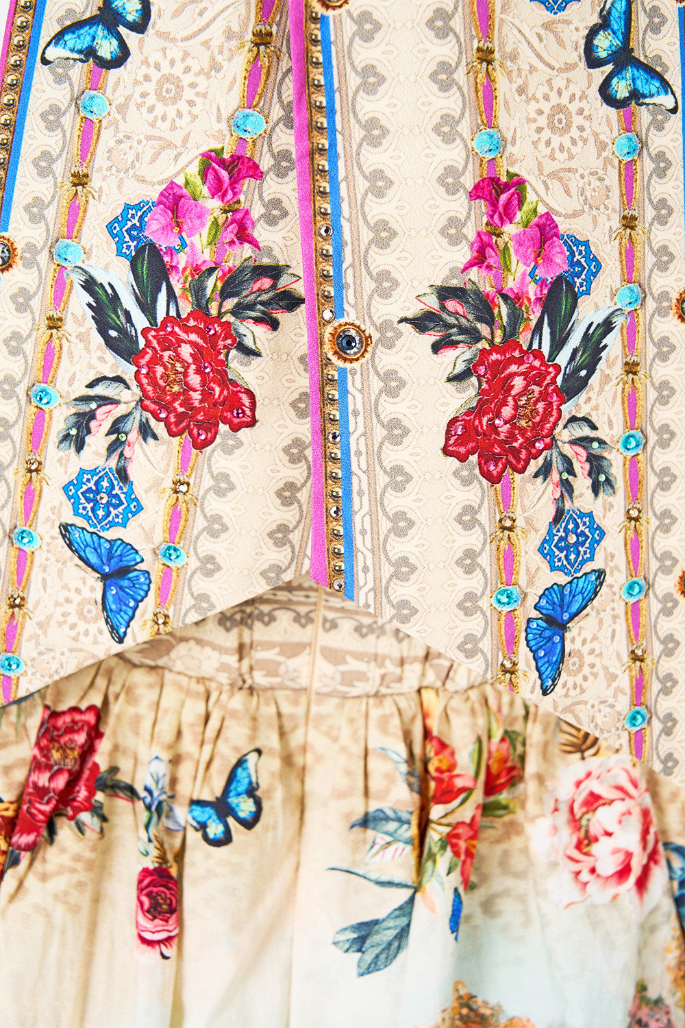The CAMILLA RUFFLE HEM HALTER SHORT DRESS BODRUM BOTANICALS in our  print.
