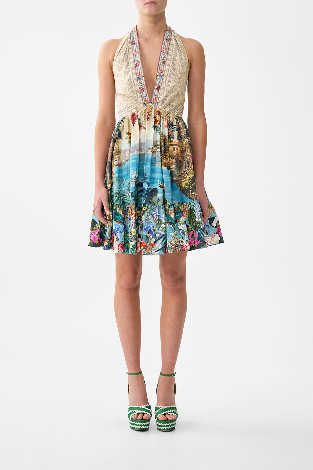 The CAMILLA RUFFLE HEM HALTER SHORT DRESS BODRUM BOTANICALS in our BODRUM BOTANICALS print.