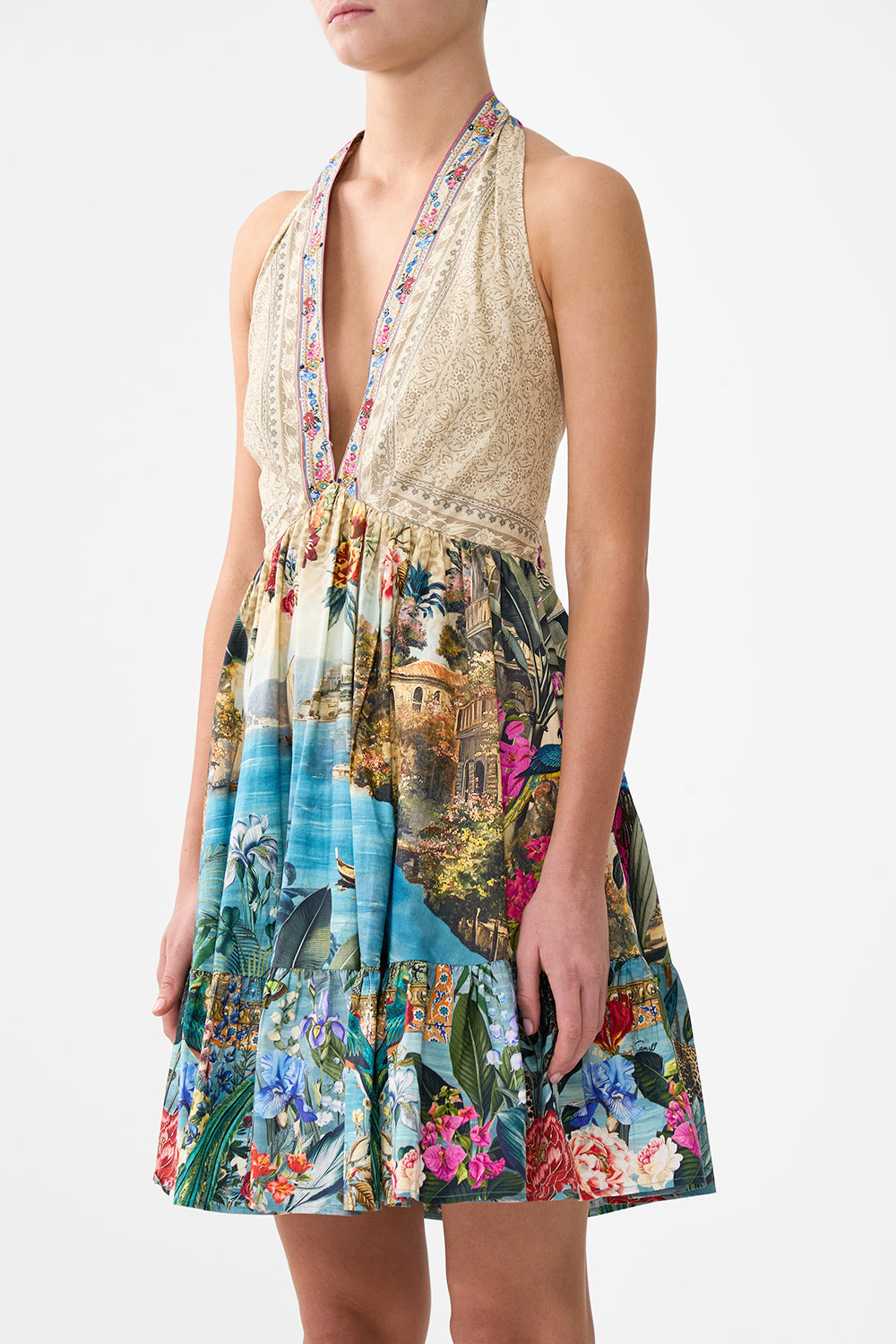 The CAMILLA RUFFLE HEM HALTER SHORT DRESS BODRUM BOTANICALS in our  print.