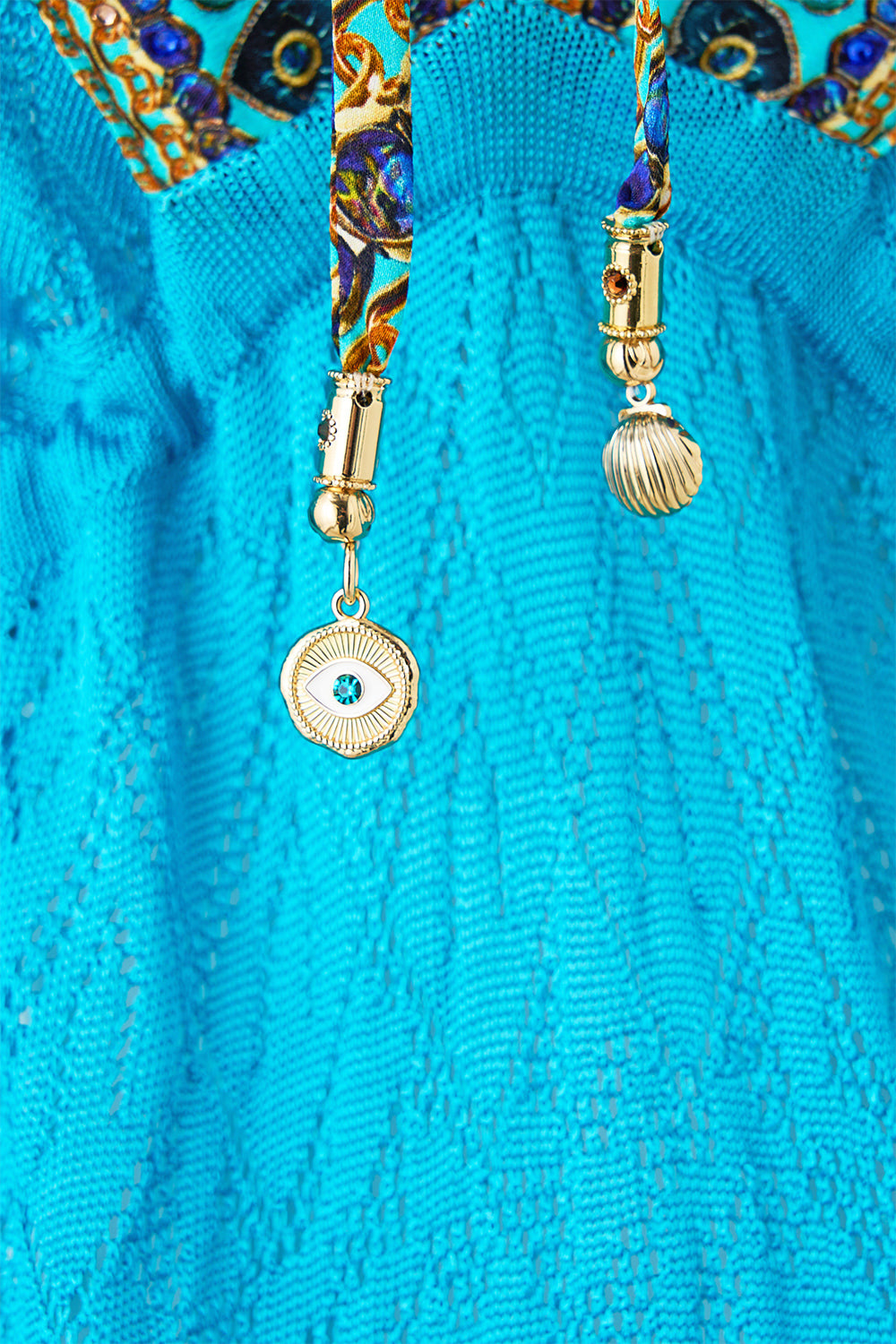 The CAMILLA KNIT KAFTAN WITH SILK NECKLINE TOTEMS AND TREASURES in our  print.
