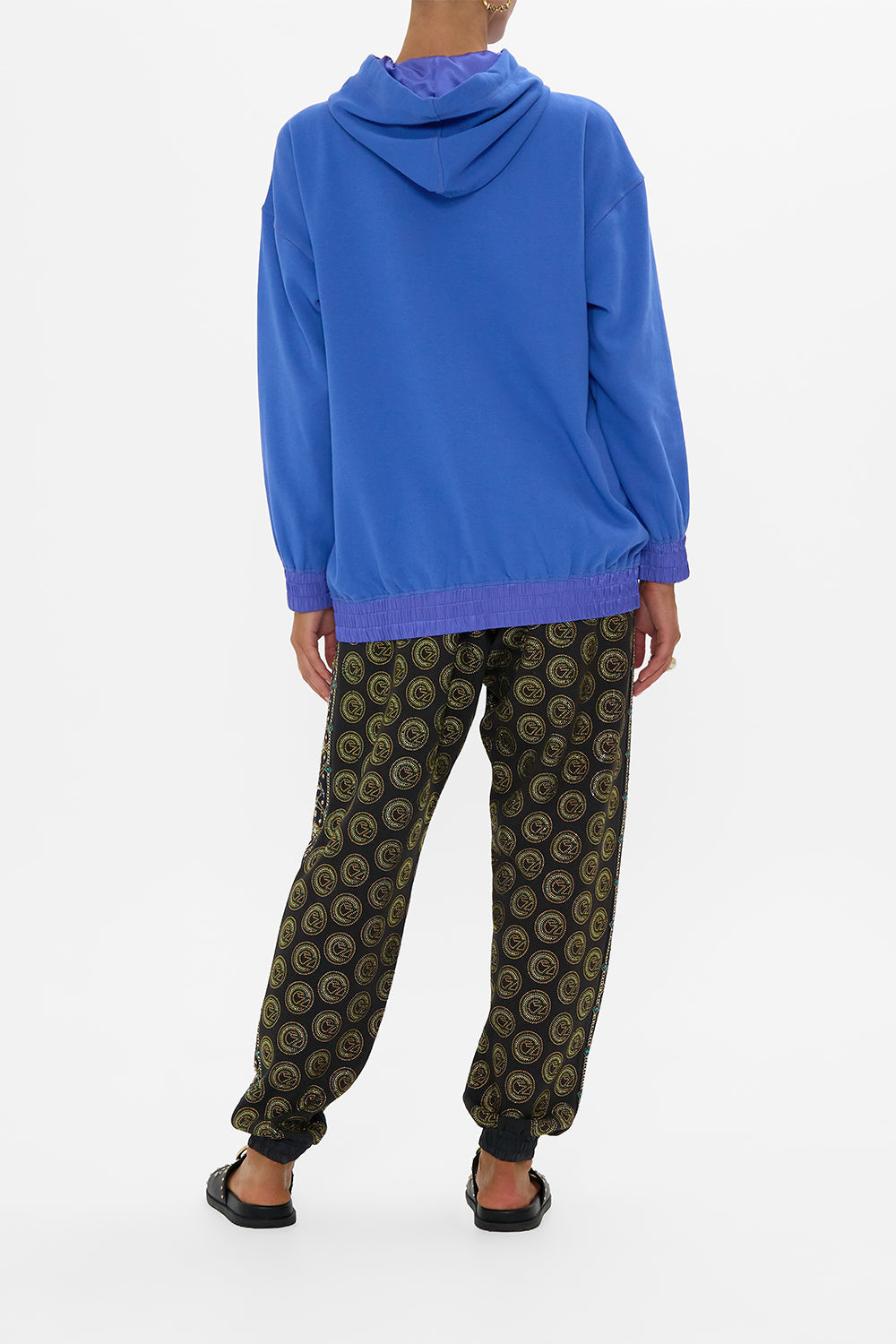 The CAMILLA SILK BAND OVERSIZED HOODIE WITH POCKETS- BLUE DEFY GRAVITY in our  print.