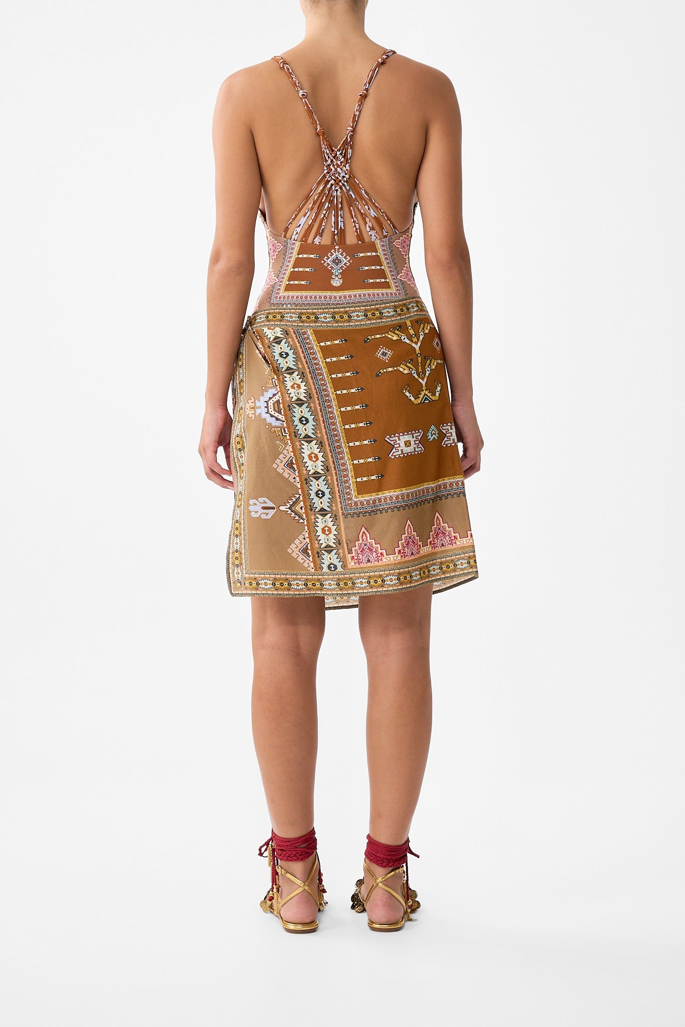 The CAMILLA WOVEN SHORT SARONG WITH MACRAME TIE WAIST FABRIC OF TIME in our  print.