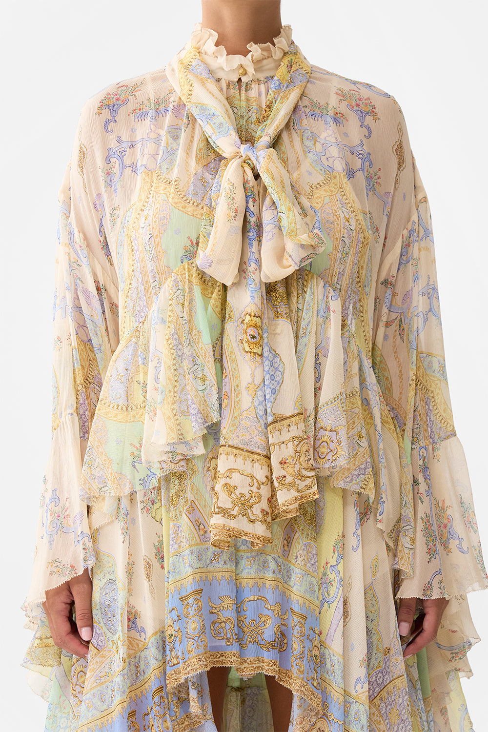 The CAMILLA RUFFLE HIGH LOW DRESS WITH LONG SLEEVE EAST OF ISTANBUL in our  print.