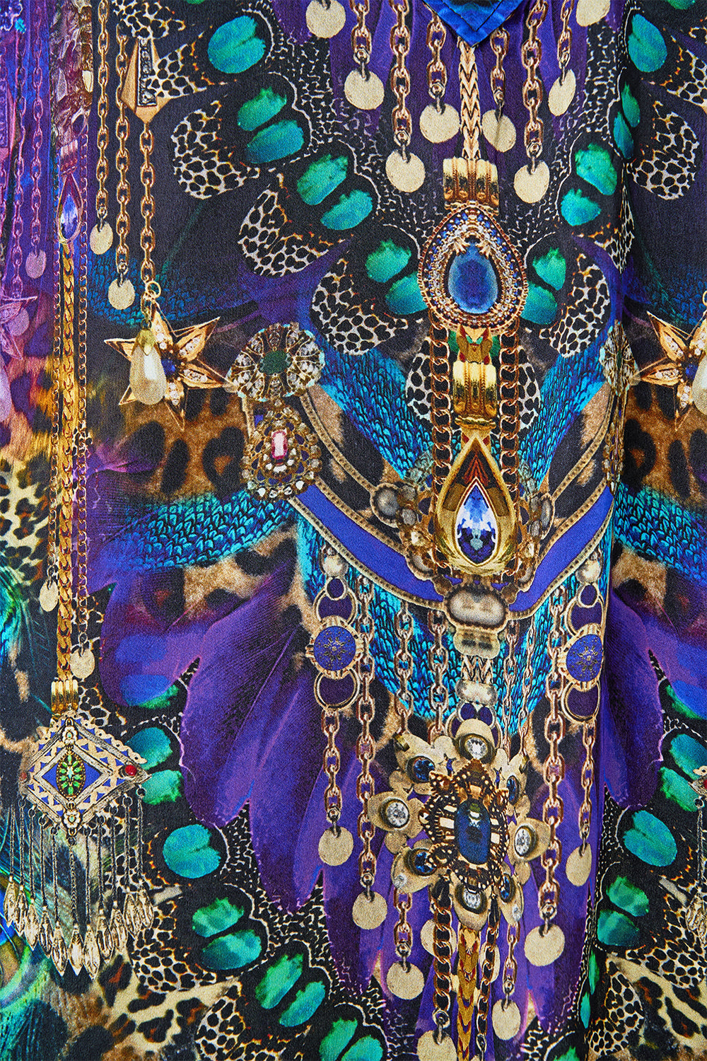 The CAMILLA DEEP V NECK HARDWARE SHORT KAFTAN COSMIC ZOOLOGY in our  print.