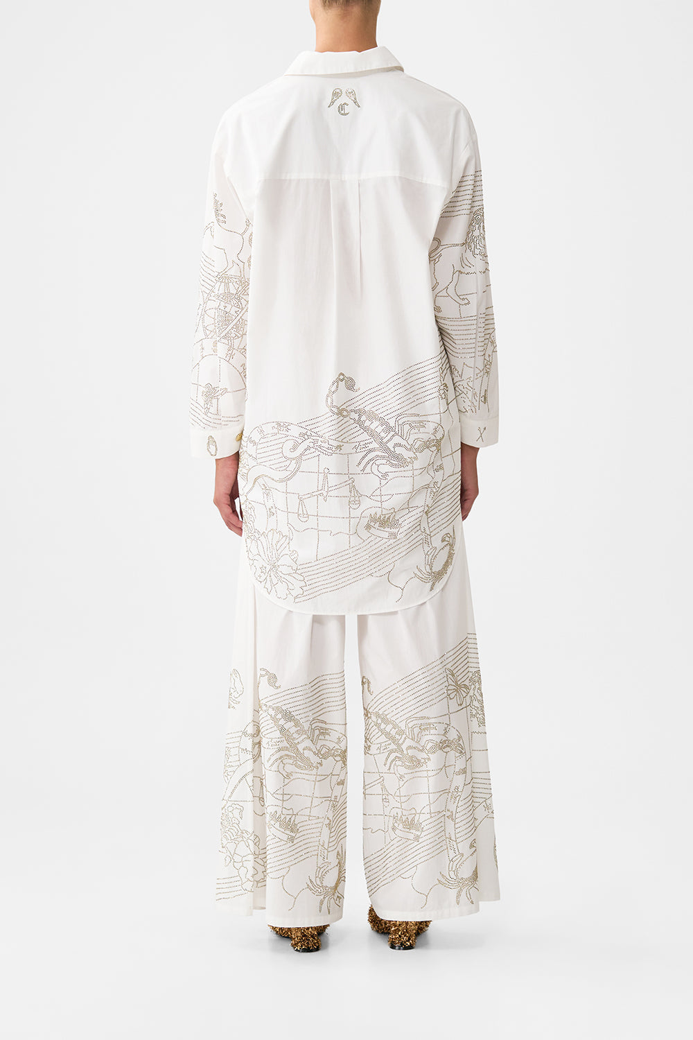 The CAMILLA SHIRT TUNIC WITH SIDE BUTTONS HOUSE OF HOROSCOPES in our  print.