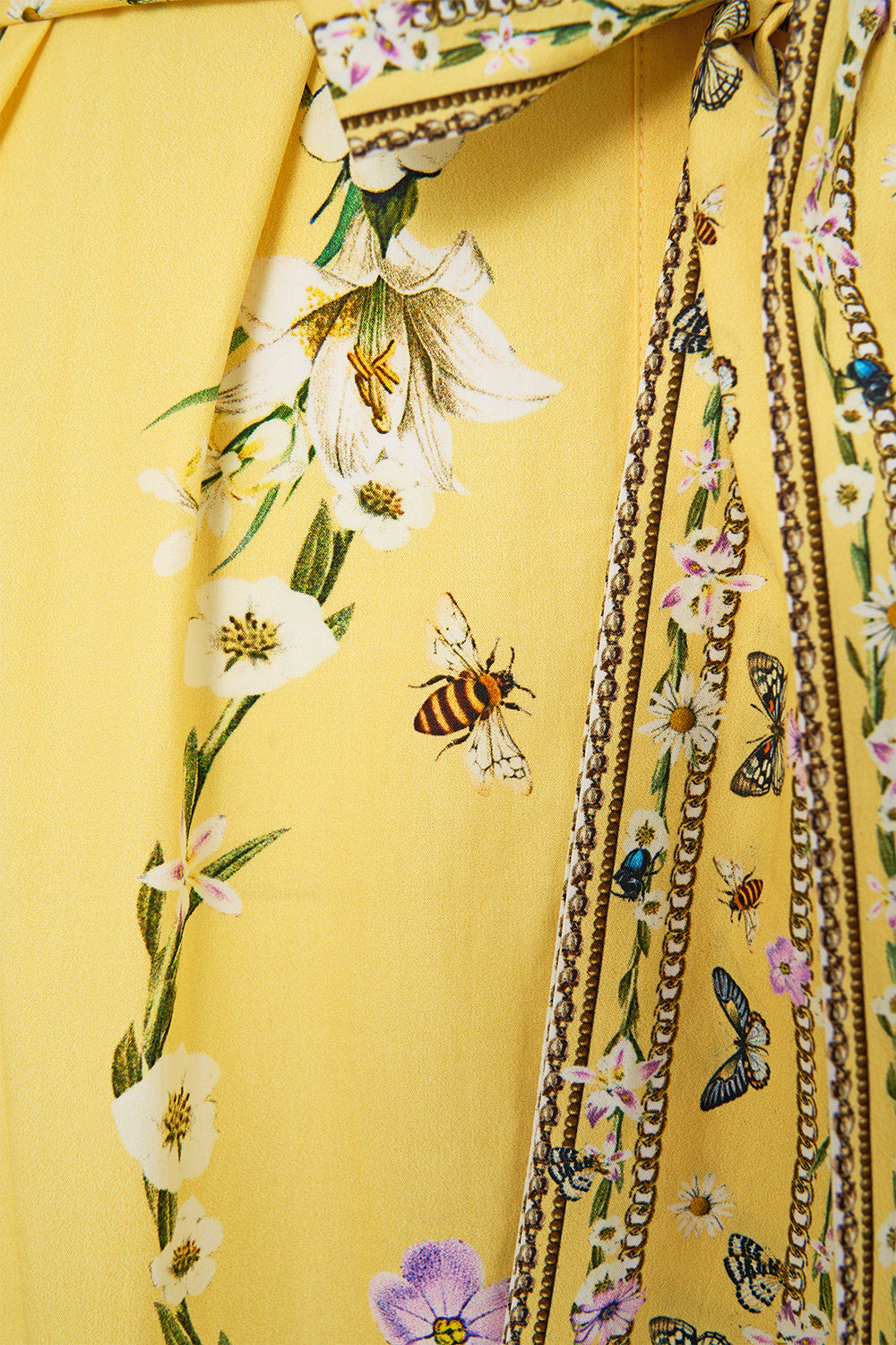 The CAMILLA TIERED SHIRT DRESS WITH SHORT SLEEVE DAISY CHAINS in our  print.
