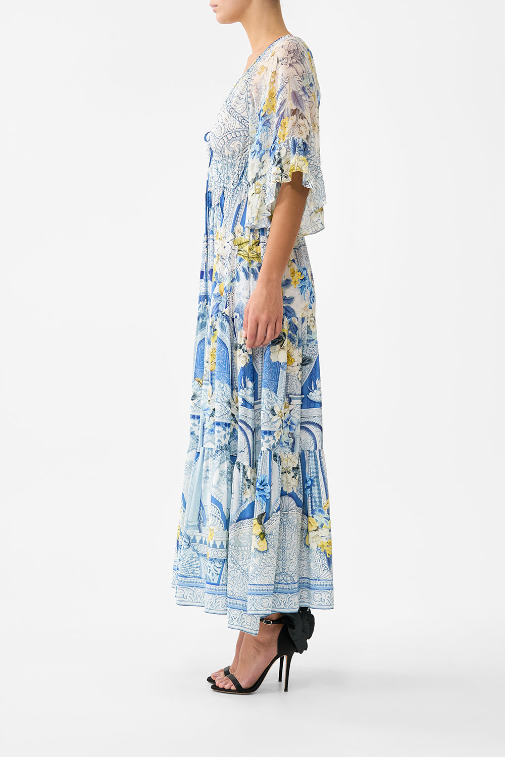 The CAMILLA RUFFLE SLEEVE LONG DRESS DE NADA GRANADA in our  print.