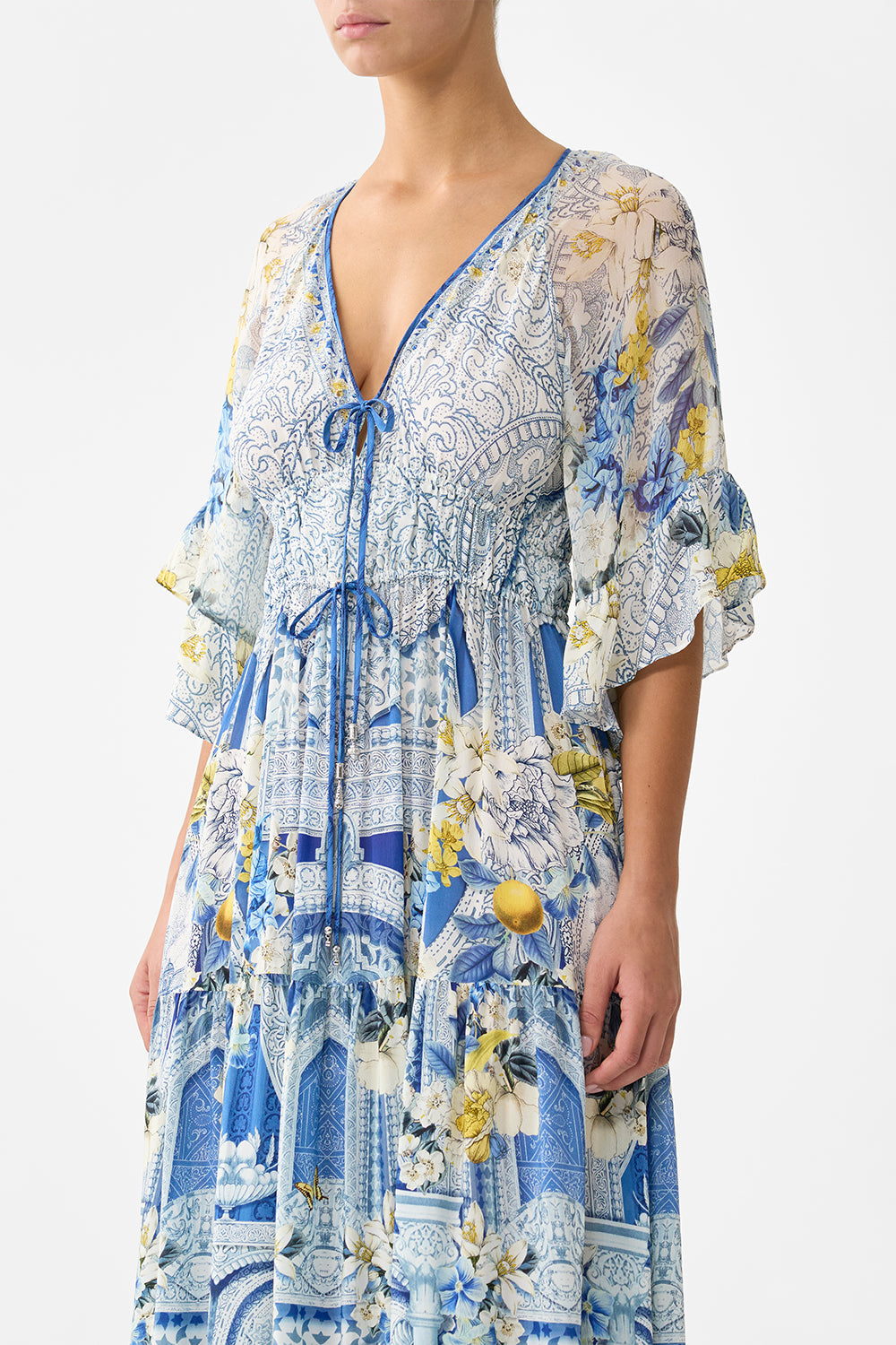 The CAMILLA RUFFLE SLEEVE LONG DRESS DE NADA GRANADA in our  print.