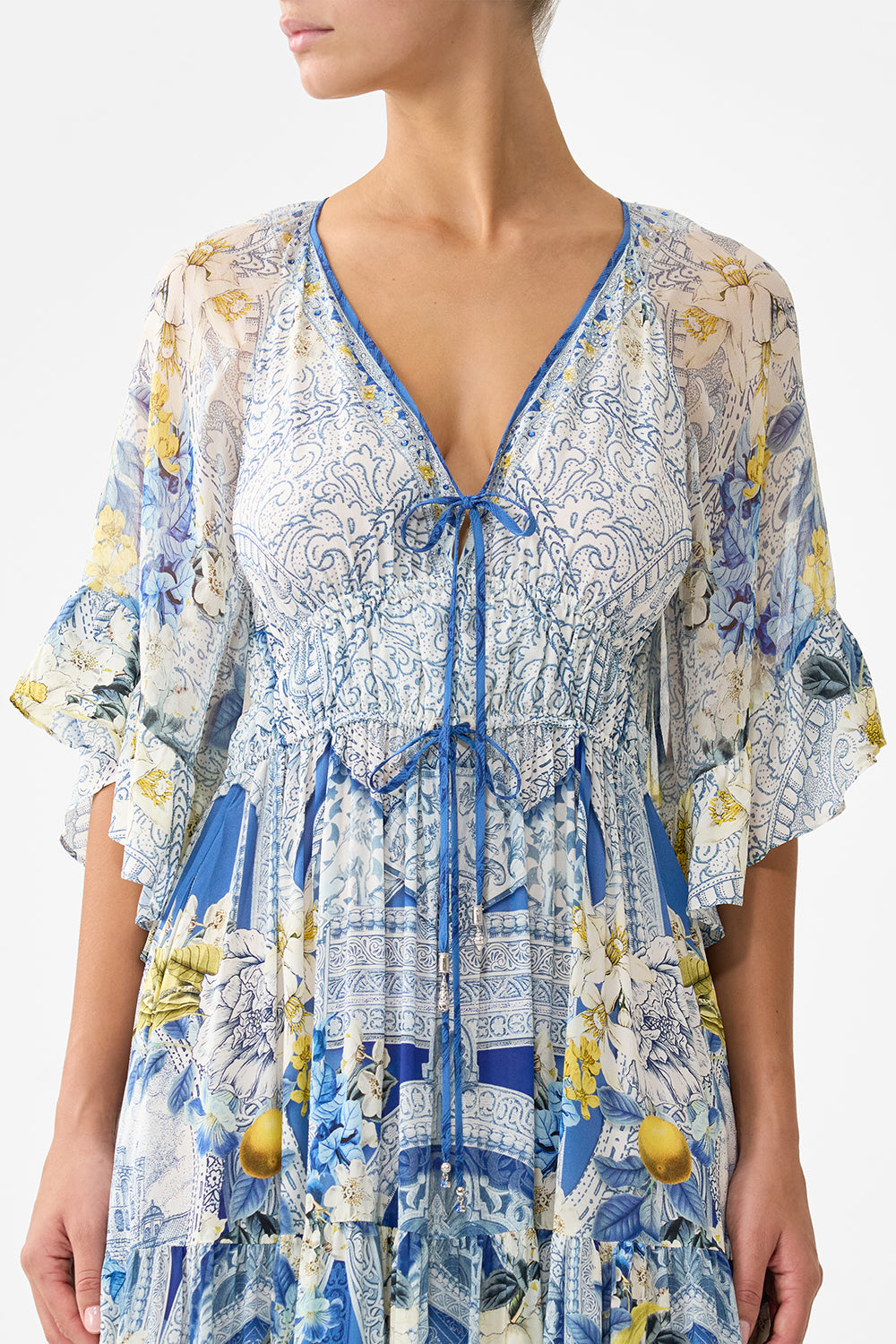 The CAMILLA RUFFLE SLEEVE LONG DRESS DE NADA GRANADA in our  print.