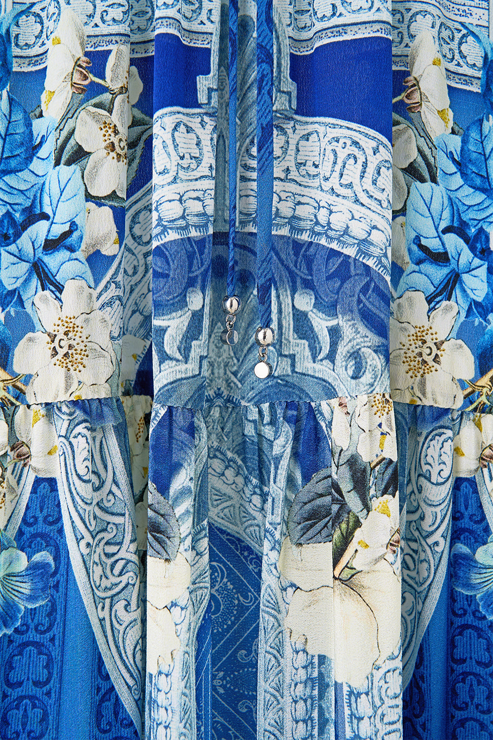 The CAMILLA RUFFLE SLEEVE LONG DRESS DE NADA GRANADA in our  print.