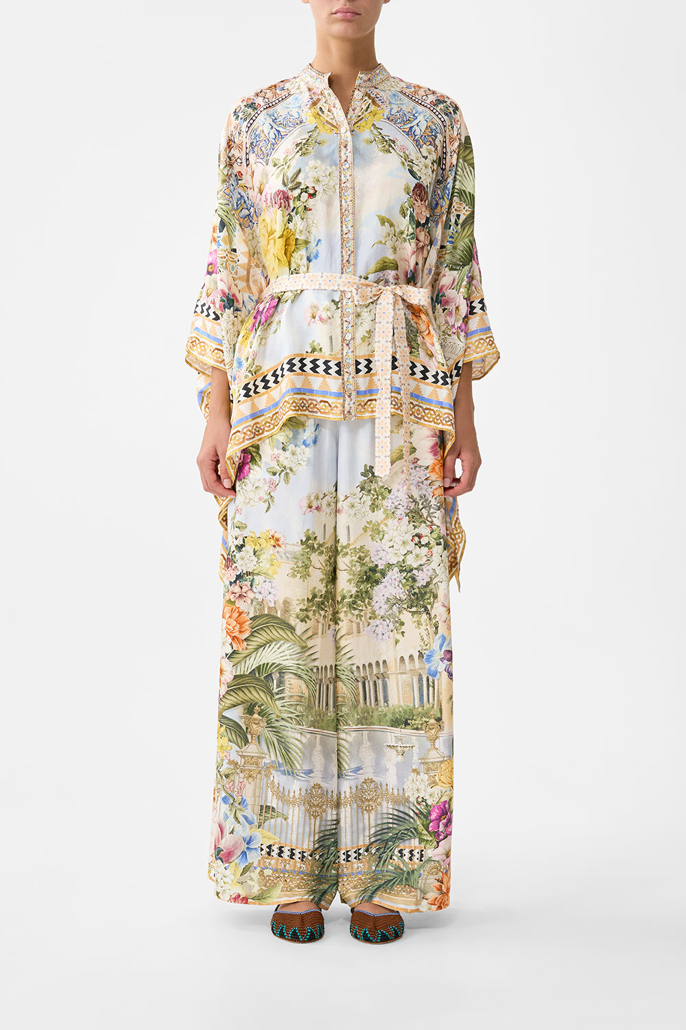 The CAMILLA button through scarf blouse in our print The Architects of Alcázar. Front model view.