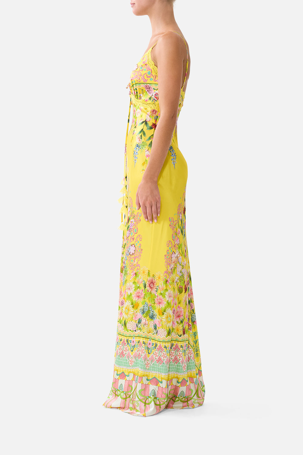 The CAMILLA bias slip dress with lace edge detail in our print Lady Limonada. Side model view.