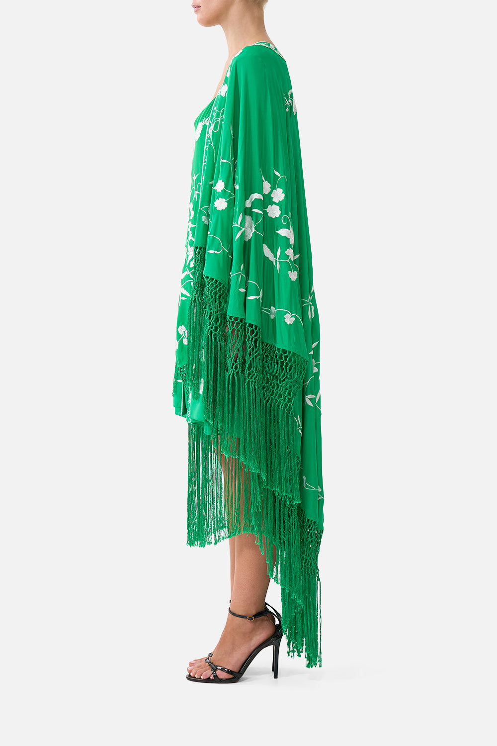 The CAMILLA draped high low layer in our print Sacromonte Señorita. Side model view.