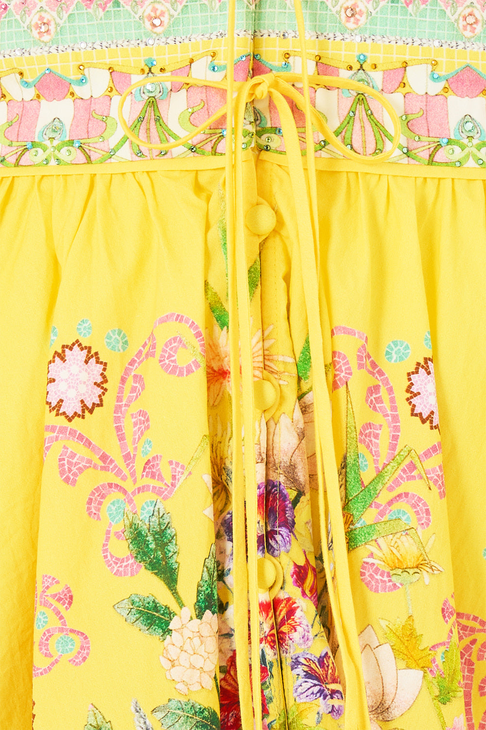 The CAMILLA DEEP V MINI DRESS WITH TIES LADY LIMONADA in our  print.