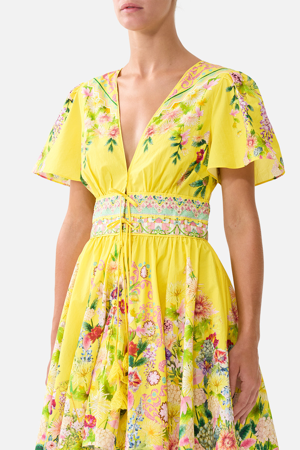 The CAMILLA DEEP V MINI DRESS WITH TIES LADY LIMONADA in our  print.