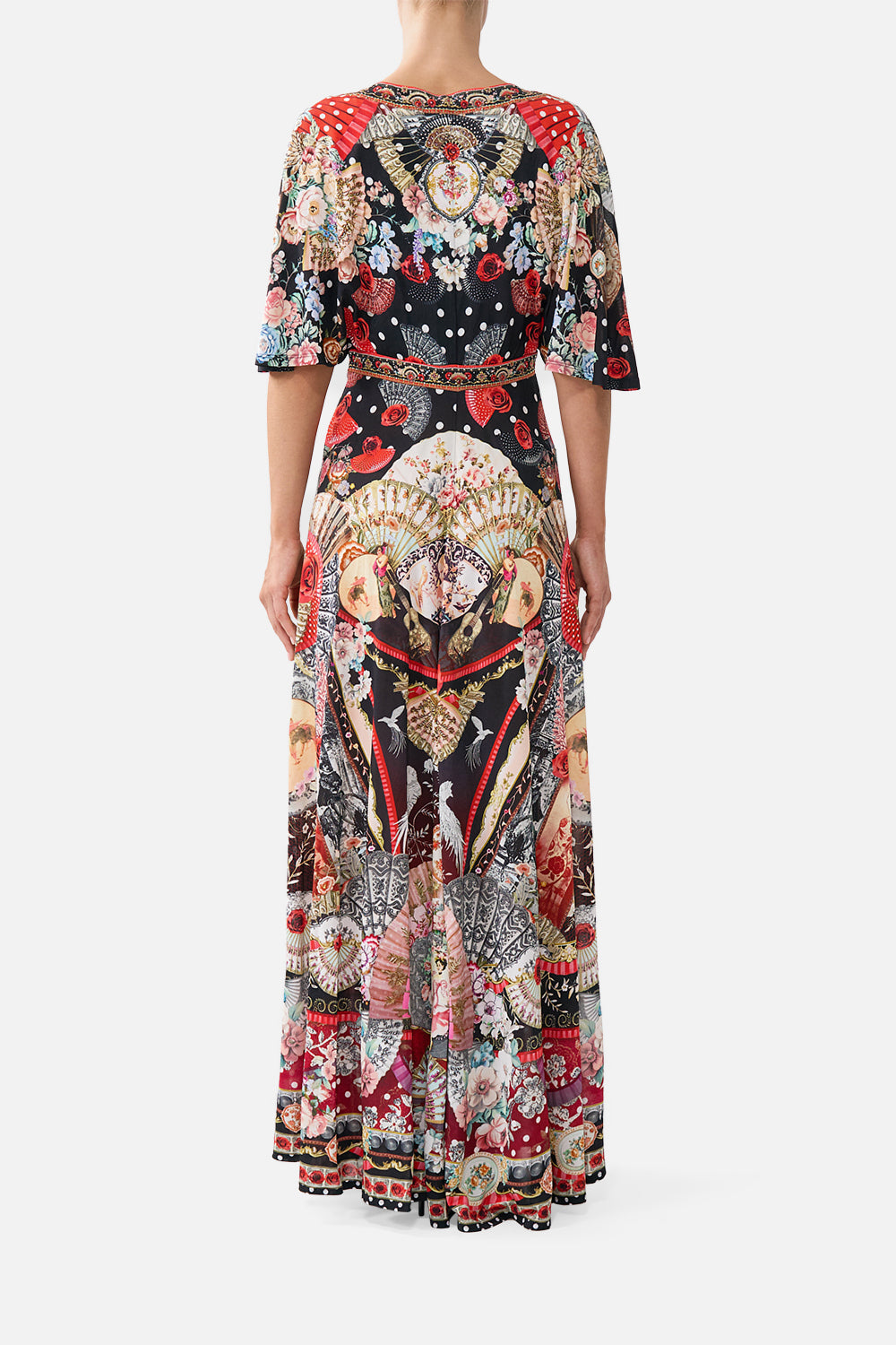 The CAMILLA flutter sleeve tie front jersey dress in our print Daughters of Duende. Back model view.