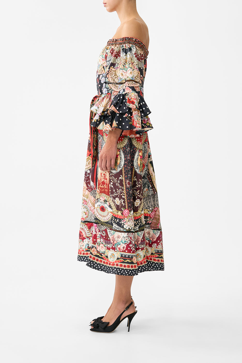 The CAMILLA OFF SHOULDER MIDI DRESS WITH FRILL SLEEVE DAUGHTERS OF DUENDE in our  print.