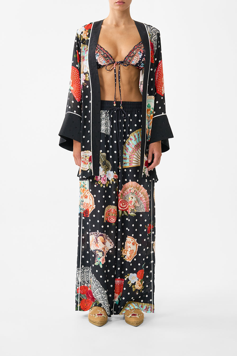 The CAMILLA straight leg pant in our print Daughters of Duende. Front model view.