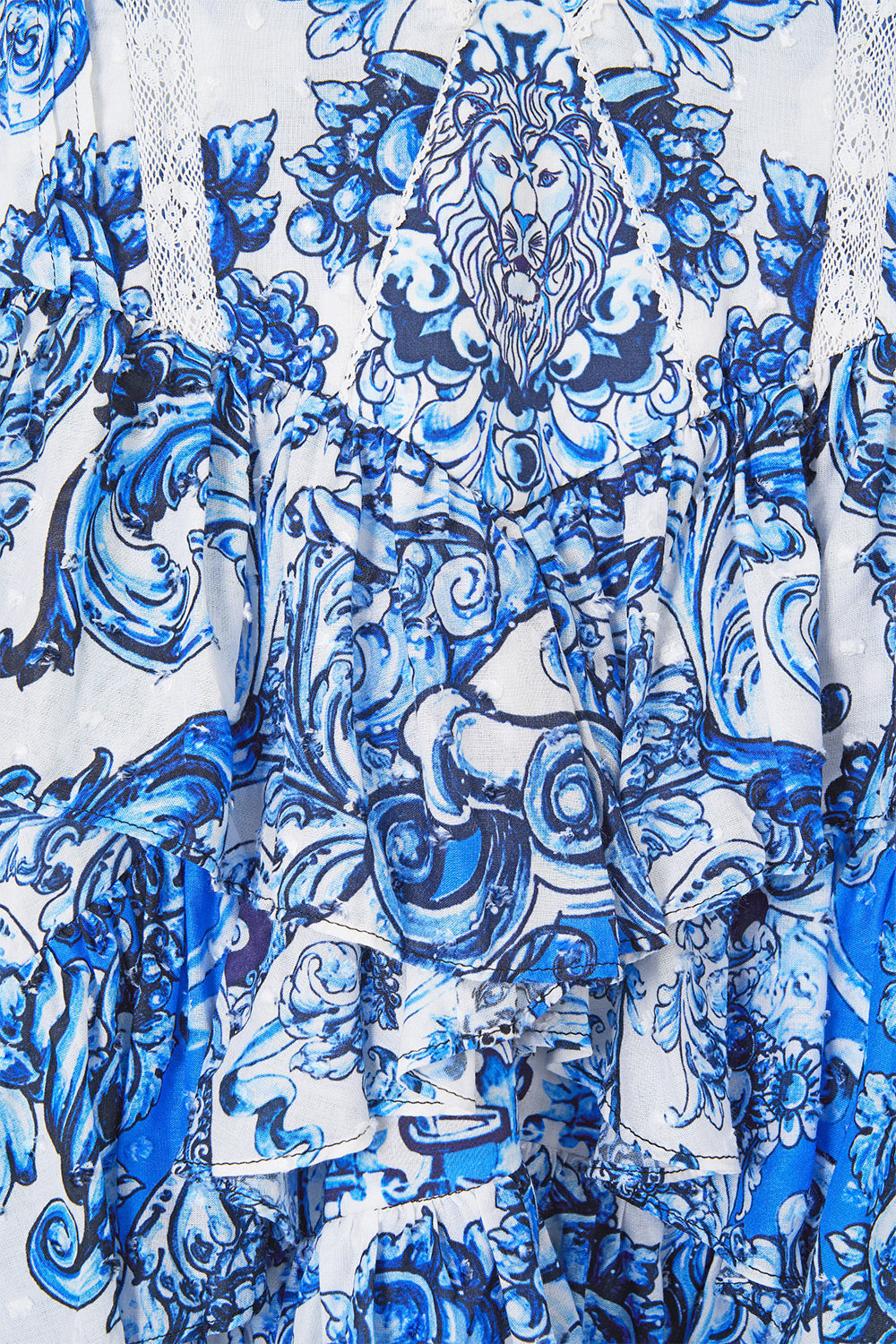 The CAMILLA V NECK RUFFLE HIGH LOW DRESS A TILED WONDERLAND in our  print.