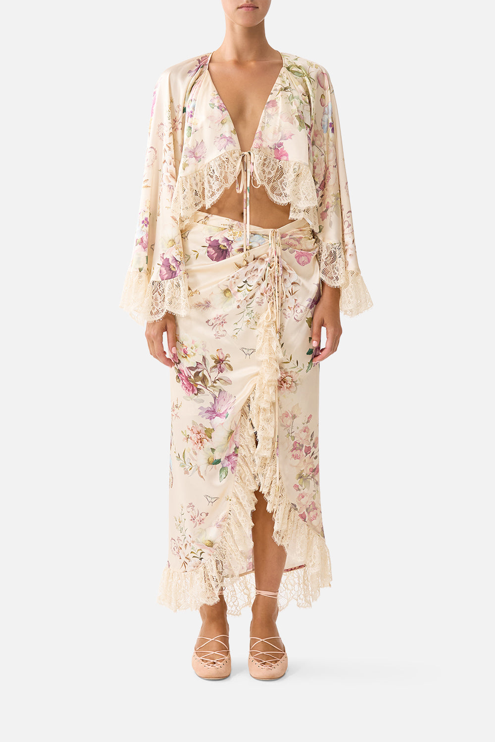 The CAMILLA WRAP TIE SKIRT WITH RUFFLE ADORNED IN ARANJUEZ in our ADORNED IN ARANJUEZ print.