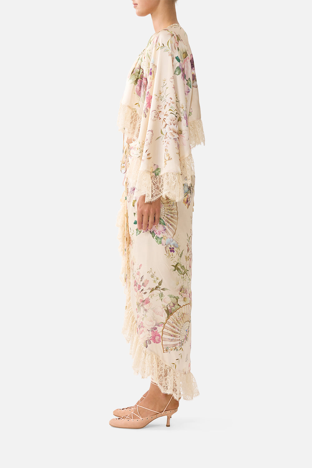 The CAMILLA WRAP TIE SKIRT WITH RUFFLE ADORNED IN ARANJUEZ in our  print.