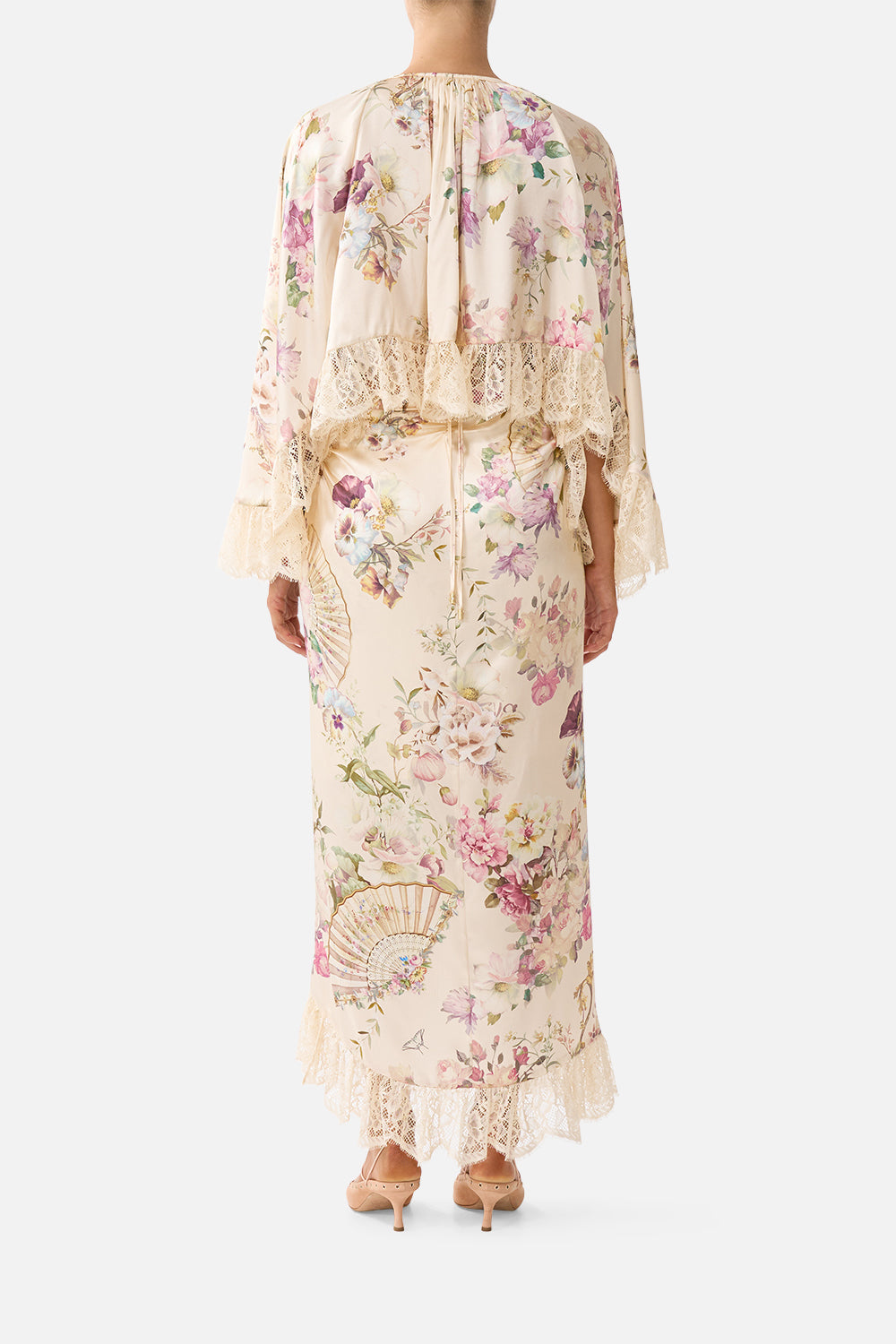 The CAMILLA WRAP TIE SKIRT WITH RUFFLE ADORNED IN ARANJUEZ in our  print.