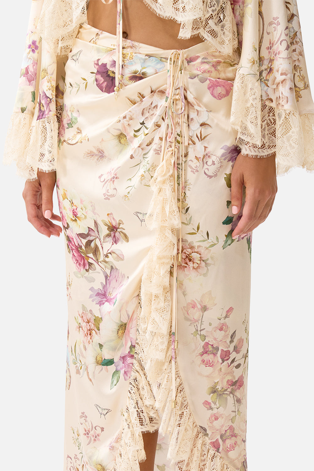The CAMILLA WRAP TIE SKIRT WITH RUFFLE ADORNED IN ARANJUEZ in our  print.