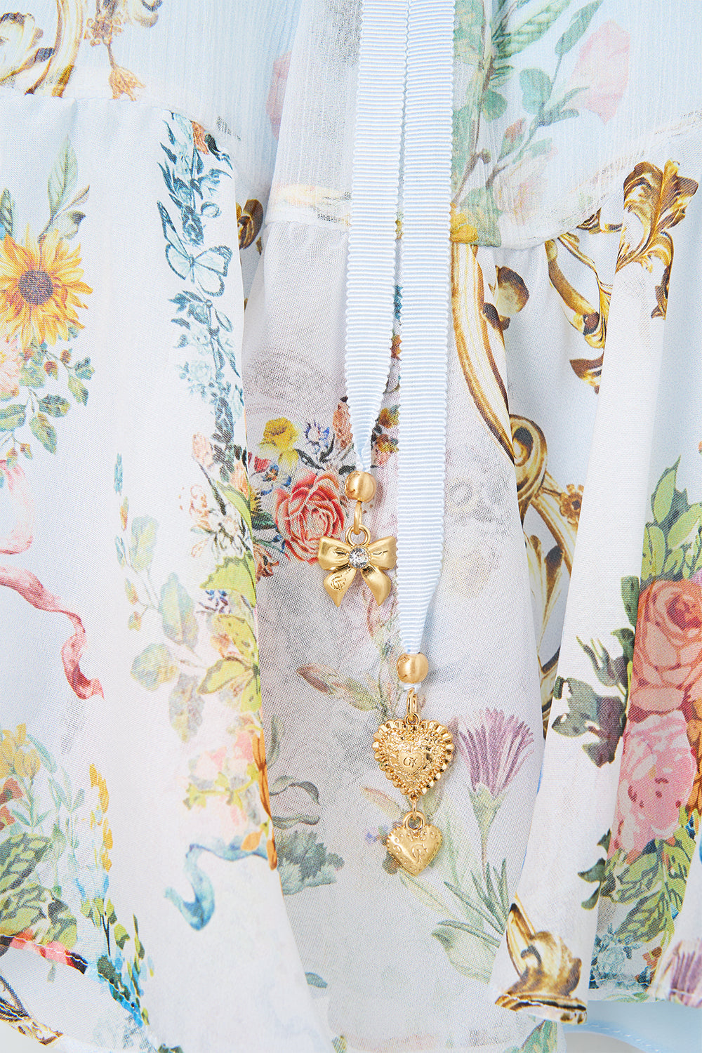 The CAMILLA ruffle sleeve short dress in our print Seville Sweetheart.