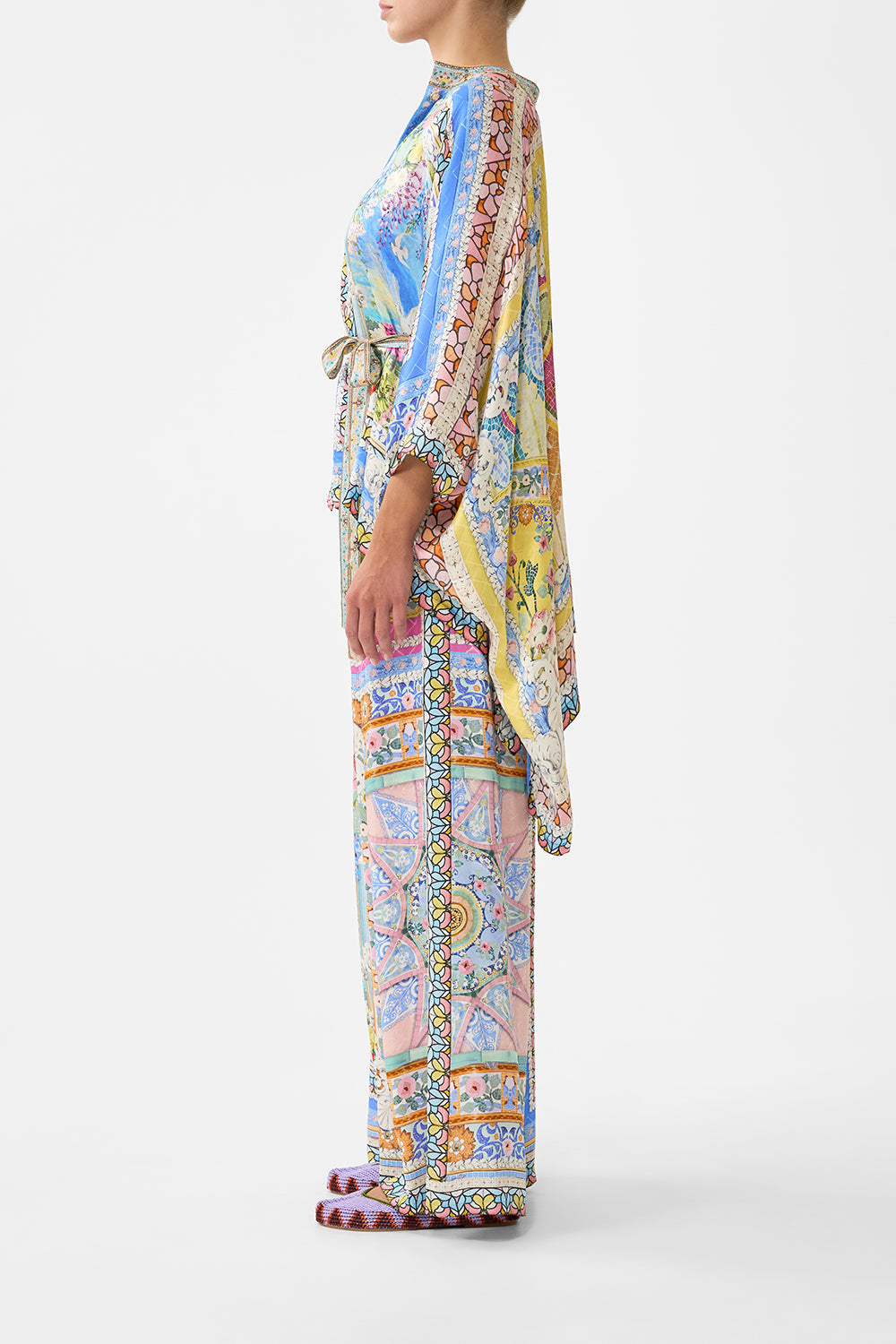 The CAMILLA tuck front pant in our print Navàs Nouveau. Side model view.