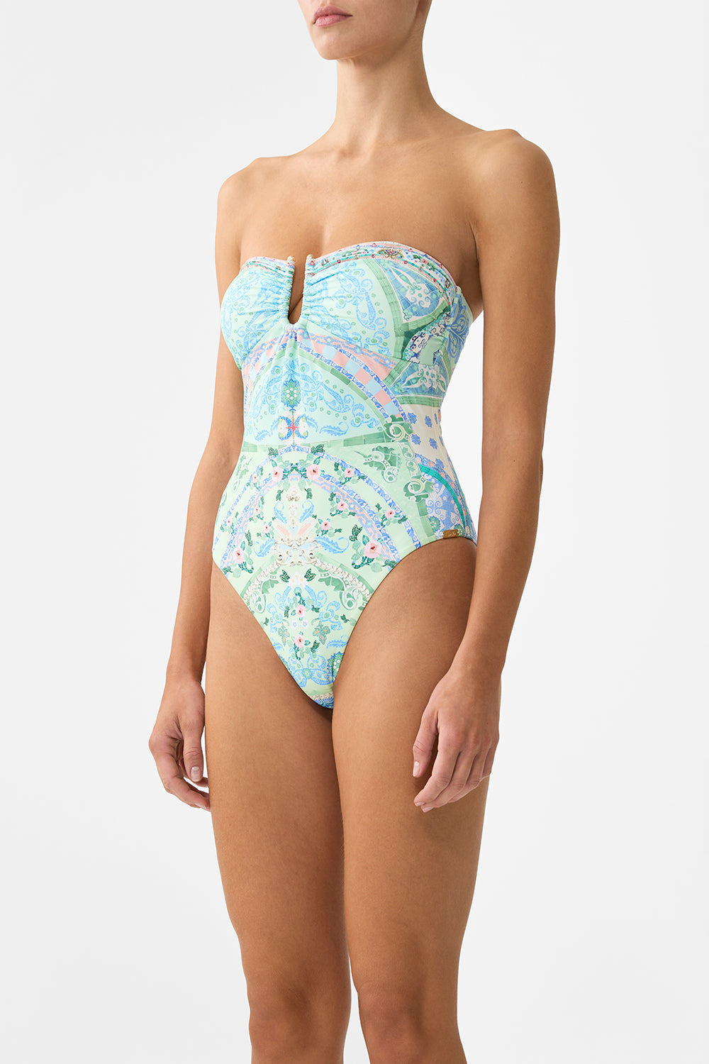 The CAMILLA GATHERED BANDEAU ONE PIECE WITH U RING FRONT MIDSUMMER MOSAICS in our  print.