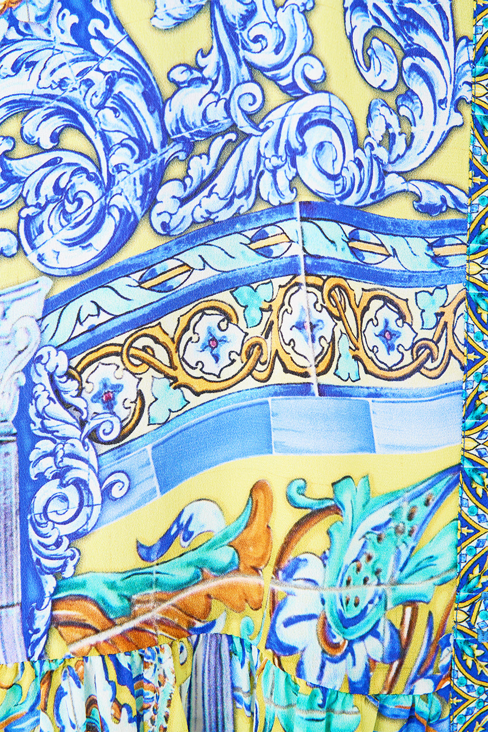 The CAMILLA LONG SLEEVE TIERED SHORT DRESS BENEATH THE ANDALUSIAN SUN in our  print.