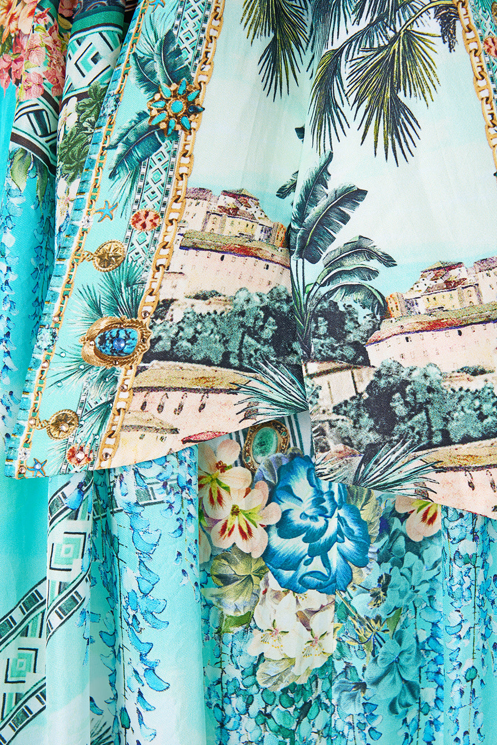 The CAMILLA TIE NECK LONG DRESS BALEARIC BEBÉ in our  print.