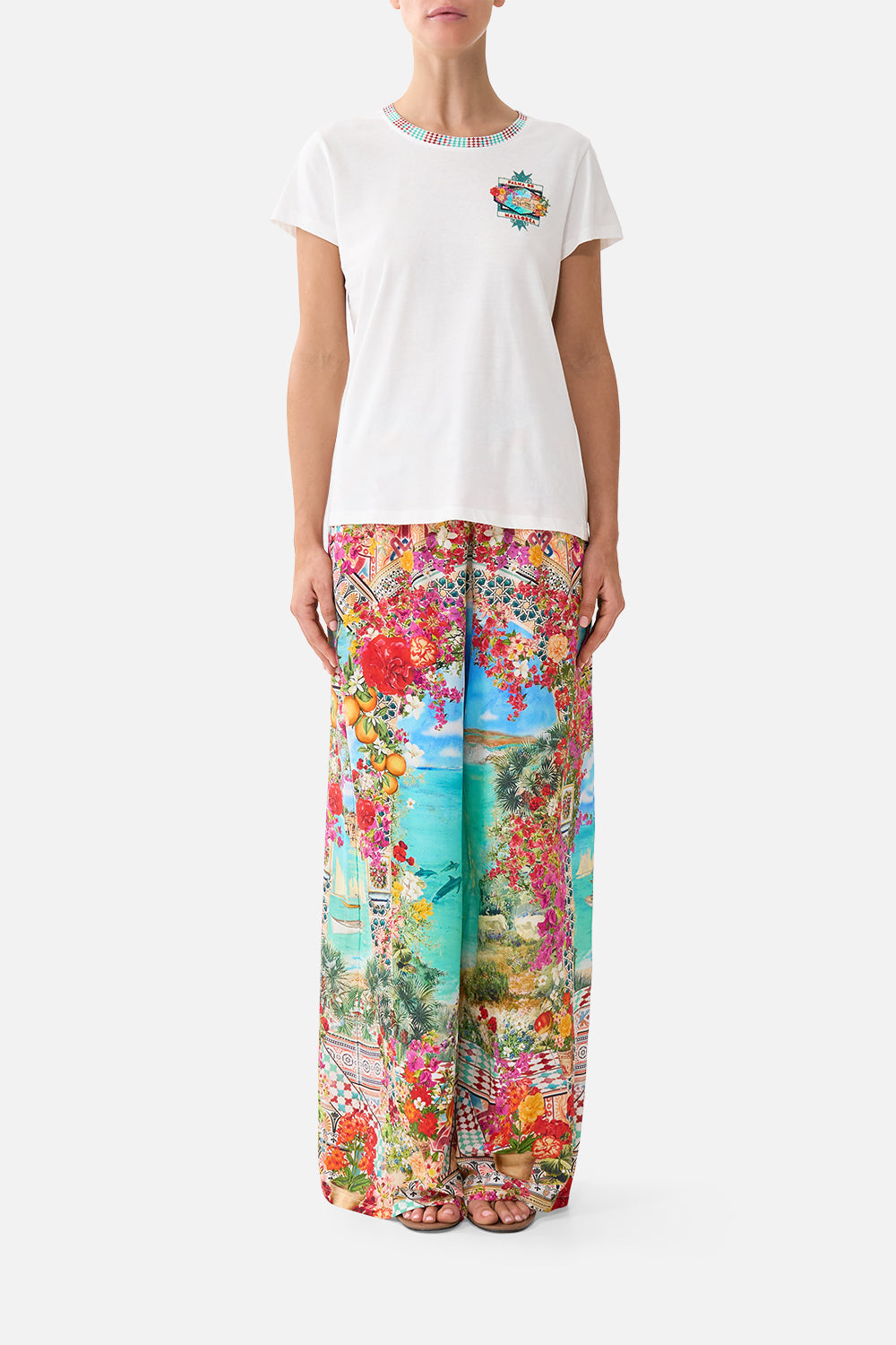 The CAMILLA slim fit round neck t shirt in our print Meet Me in Mallorca. Front model view.